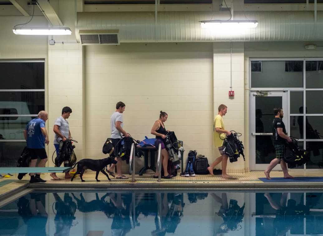 Participants in Tobin’s scuba certification course work with a variety of equipment, such as the self-contained underwater breathing apparatus.