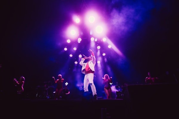 AXS talent on stage branding.jpeg