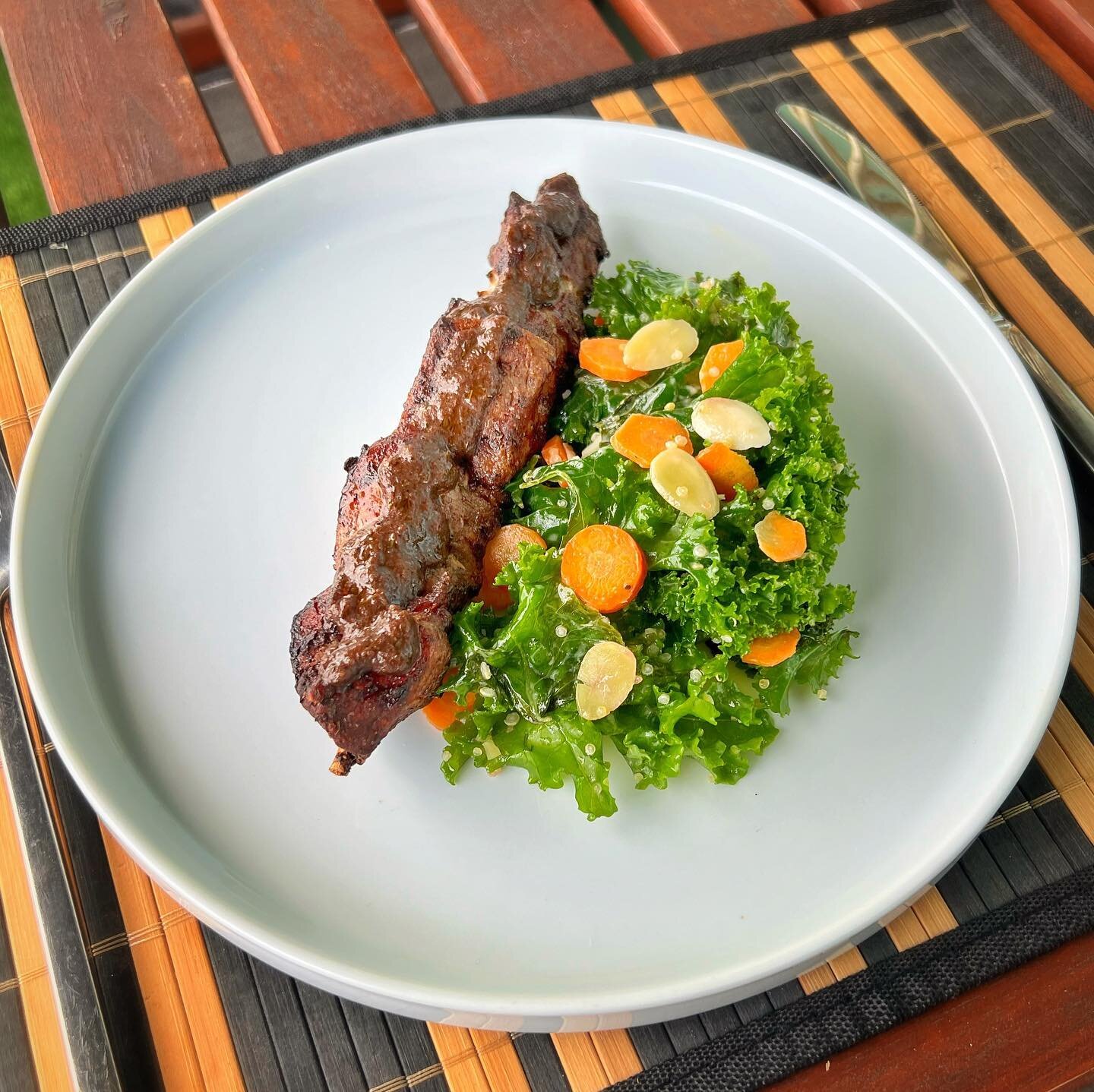 Grilled Jerk Pork Skewer w/ @phlippens Jerk Sauce &amp; Kale Salad w/ Carrots, Almonds &amp; Citrus Dressing. Grilled on the @webergrillsca G2 
.
.
.
#dinner #jamaican #jerk #pork #salad #yum #yummy #yumyum #homemade #eat #eatbetter #food #foodporn #