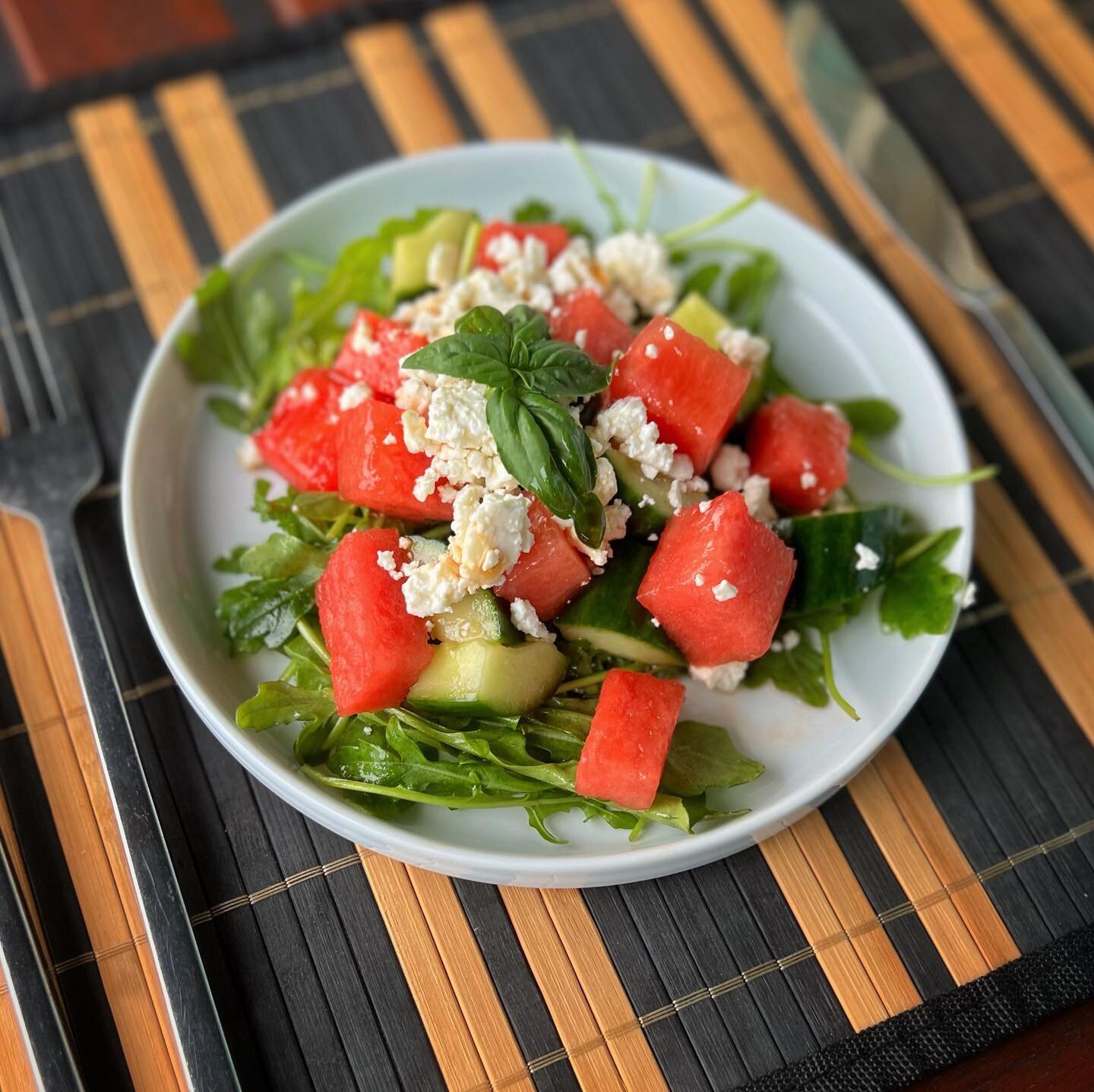 Fresh Watermelon, Cucumber &amp; Feta Salad on a bed of Arugula, Scratch Dressing &amp; Basil 🌿 and Mint from Garden
.
#patiodinner

.
.
#dinner #salad #medium #yum #yummy #yumyum #homemade #eat #eatbetter #food #foodporn #recipe #sharefood #delicio
