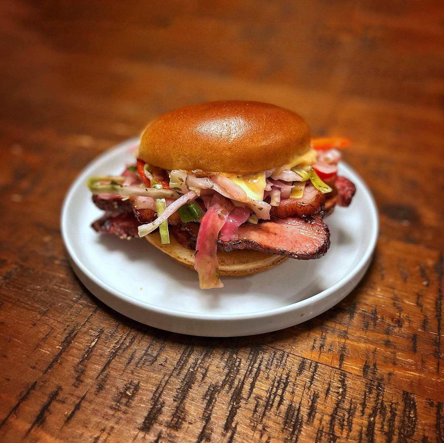 Grilled Maple Smoked Pork Loin w/ Coleslaw &amp; Honey Mustard on a Brioche Bun. Grilled with a lil @meanmoesbbq Badass Rub on the @webergrillsca G2.
.
Protein: @butchersofdistinction 
.
.
.
#barbecue #pork #bbq #bbqlife #bbqporn #carnivore #instagoo