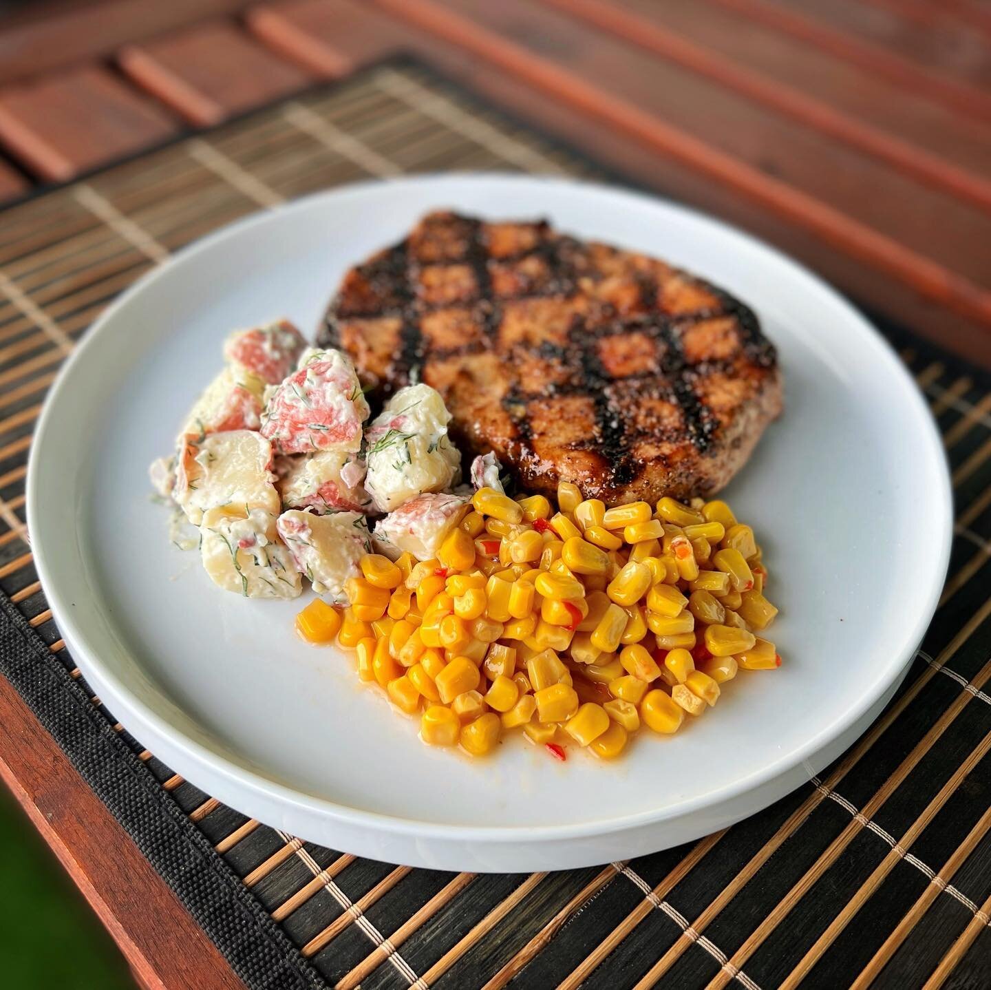 Grilled Double Pork Chop w/ Lil Mexican Street Corn &amp; Potato Salad.
.
Grill: @webergrillsca G2
Rub: @lanesbbq Cubano
Sauce: @uncle_chucks Boom Sauce
.
.
.
#barbecue #pork #bbq #bbqlife #bbqporn #carnivore #instagood #webergrills #weberforlife #di