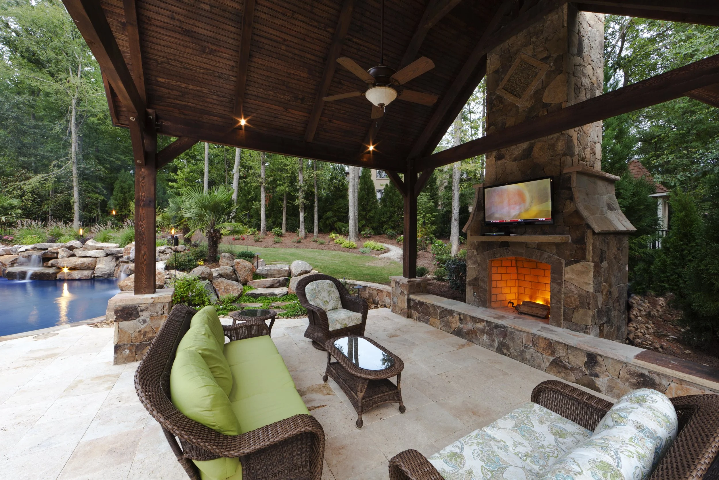 Rustic vaulted cabana that can be used most of the year with the wood burning fireplace. A great place to cozy up to the fire and watch the game.