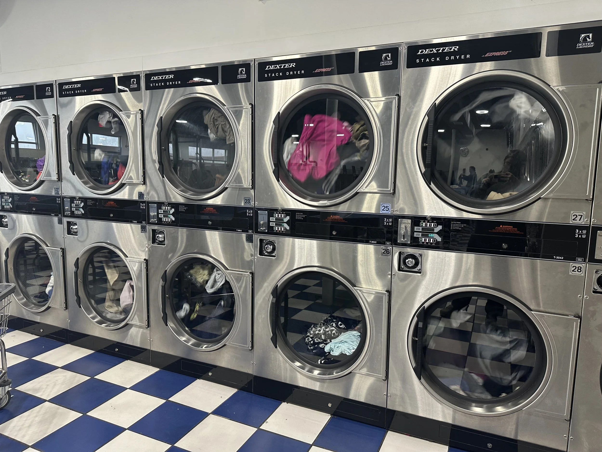 Modern Dexter self-service laundry equipment at Grandview Coin Laundry in Kansas City Missouri