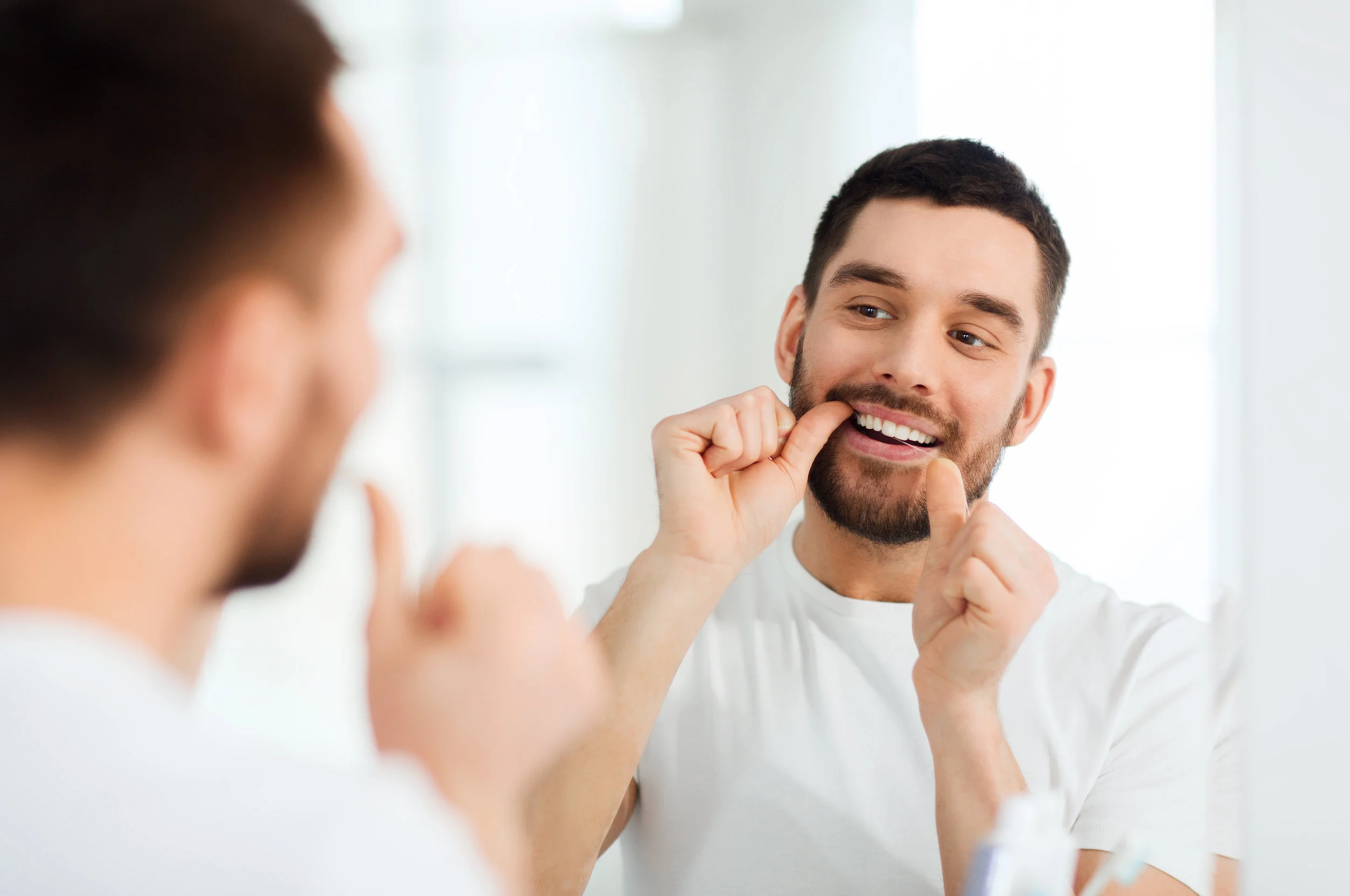 Flossing Prevents Tooth Decay and Gum Diseases
