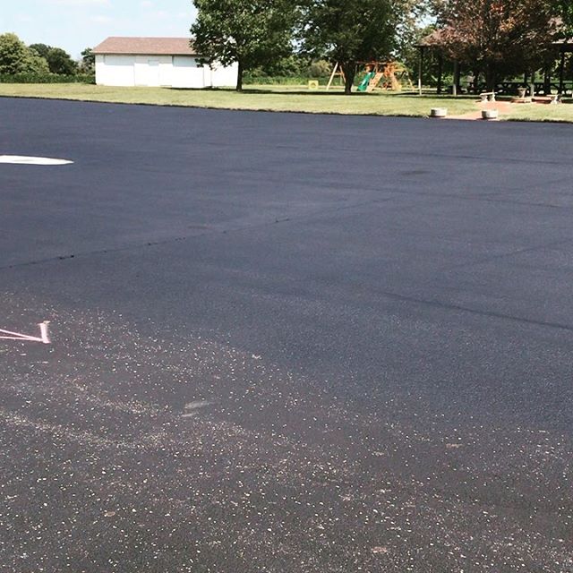 Drain repair, cleaning, crack filling, seal coating, pavement markings