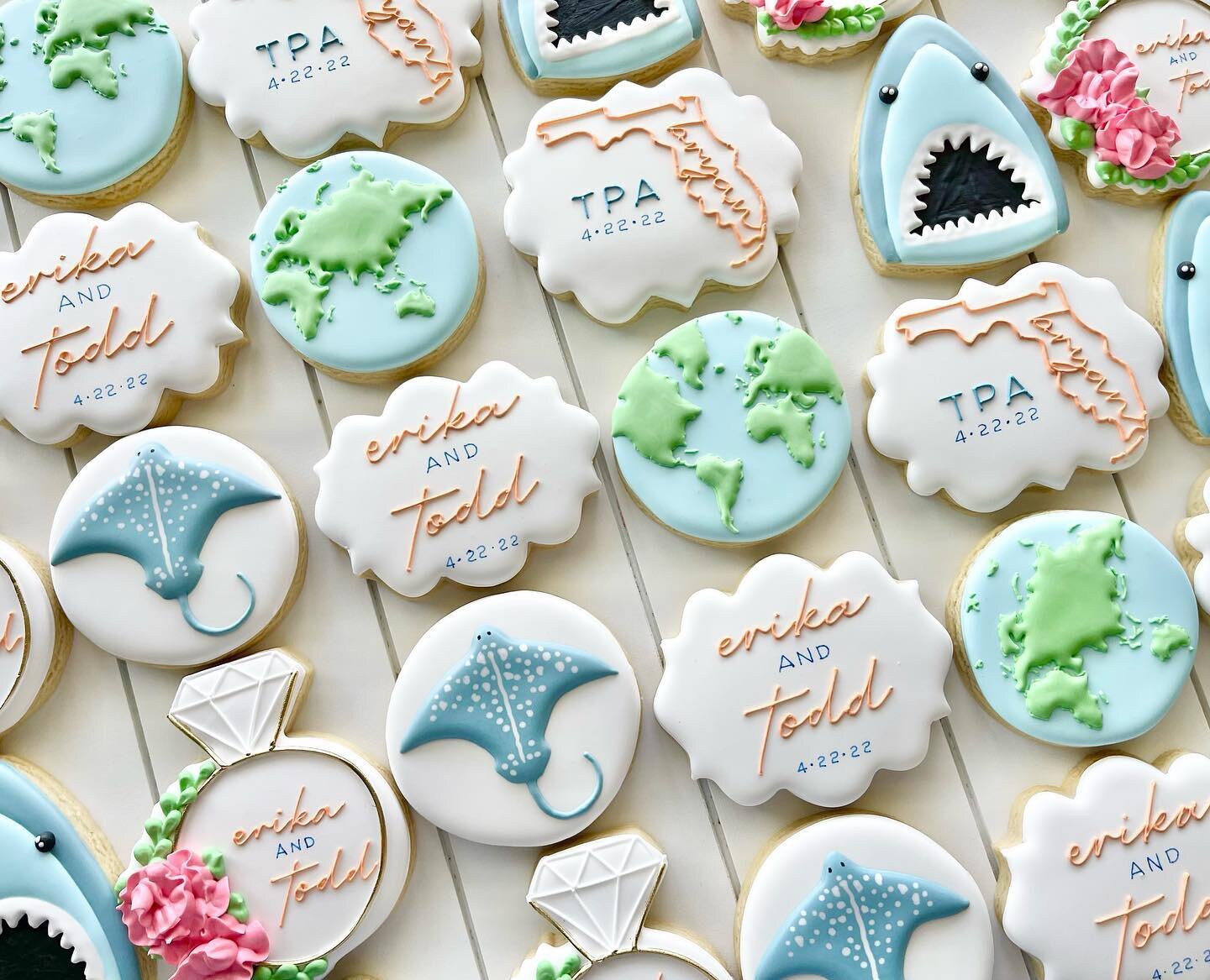 Happy wedding day Erika &amp; Todd. Happy Earth day 🌎 🦈 
.
.
.
#happyearthday #earthday #weddingday #weddingcookies #earthcookies #sharkcookies #stingraycookies #ringcookies #earth #sharks #stingray #sugarcookies #tampa #tampabay #tampacookies #tam