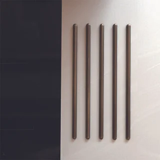 Brass rods in corian small.jpg