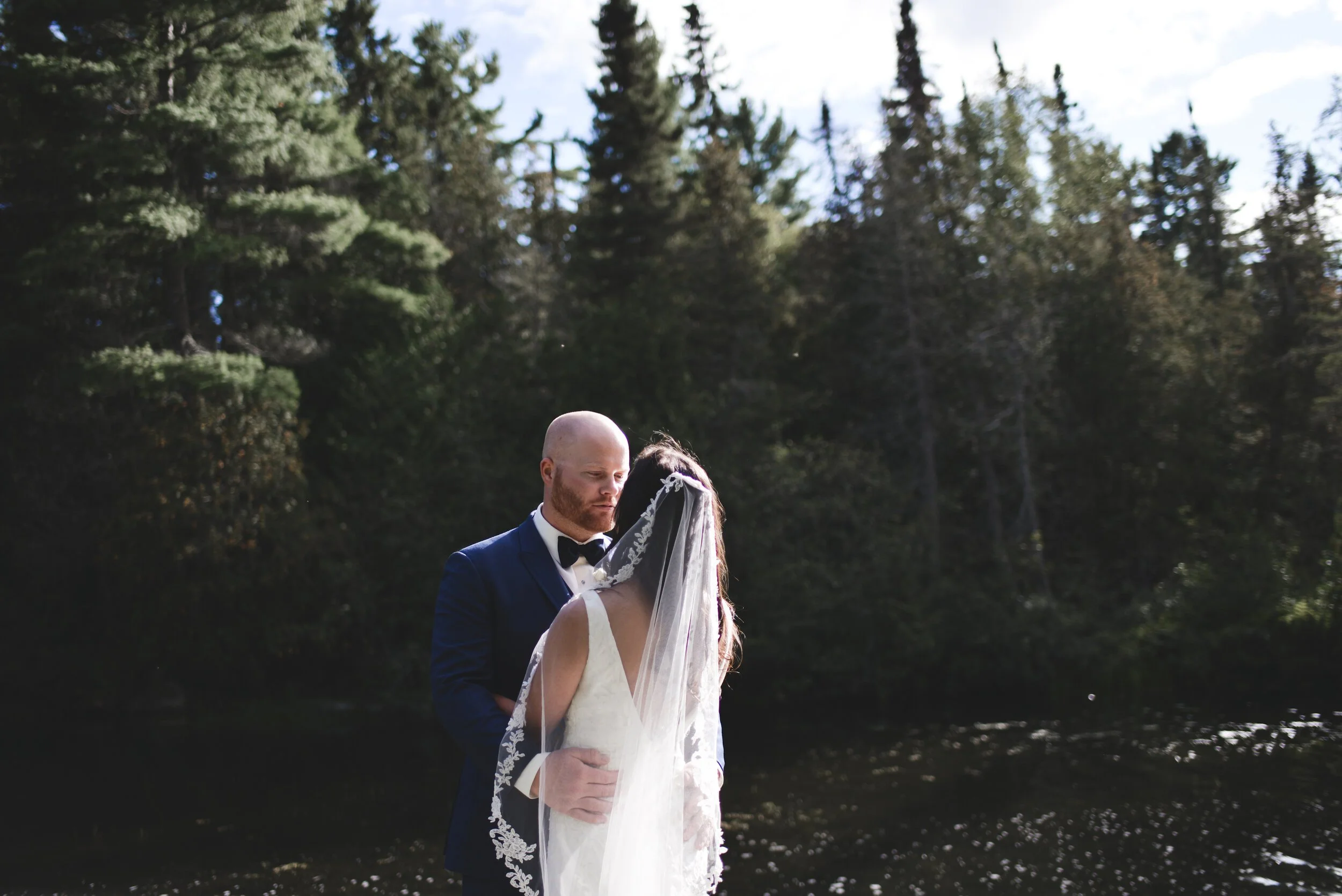 Bride + groom by the lake Niagara on the lake wedding photographer
