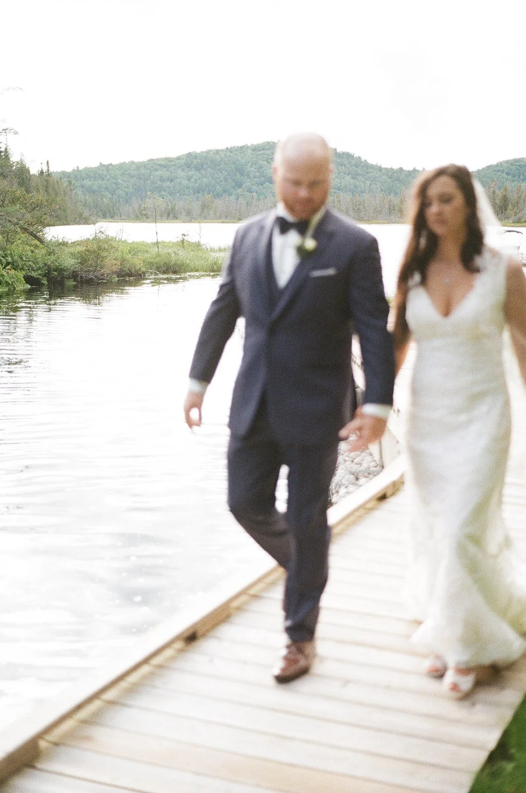 Niagara wedding photographer took this film shot of a couple by a lake