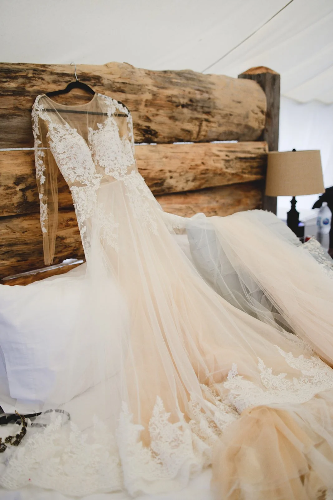 Inside Whispering Springs tent during a Whispering springs wedding with wedding dress