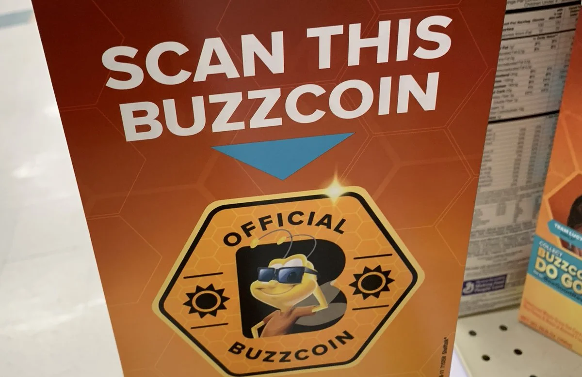 1. Kids scan the Buzzcoin on the box using a web app we built