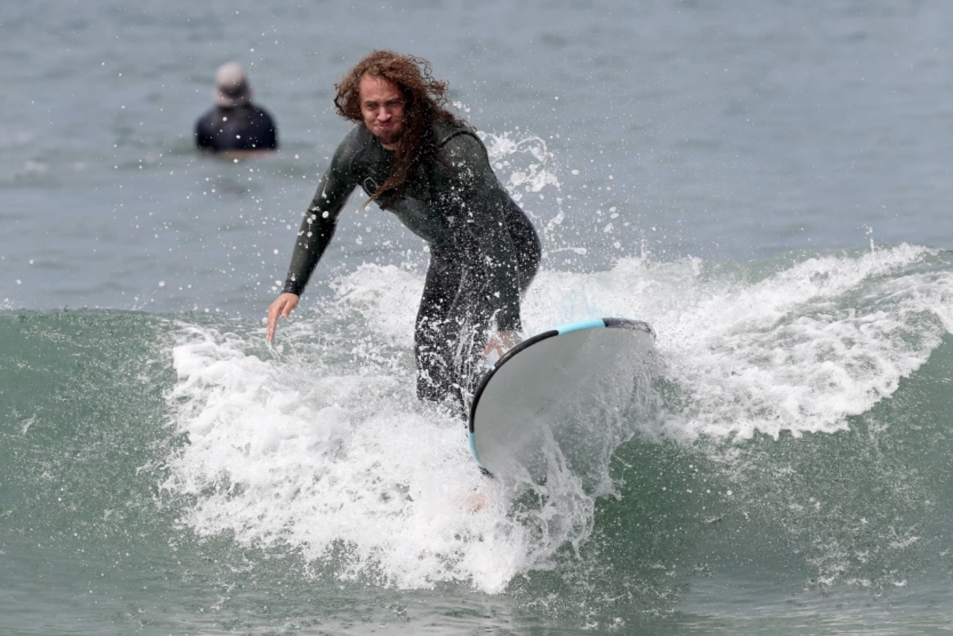 Mr. Irrelevant Grant Stuard rides waves in Newport