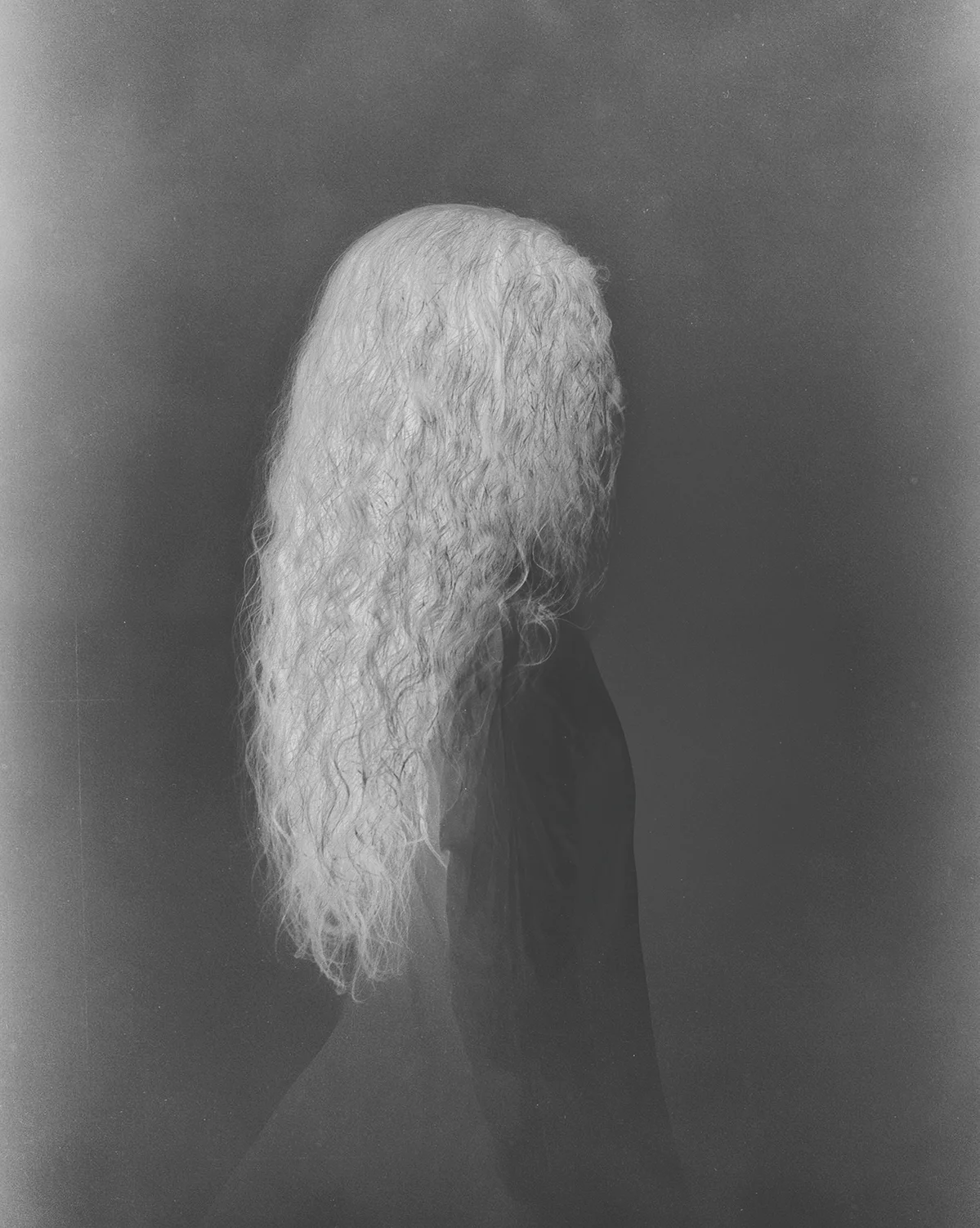 Photography in negative grey tones with portrait of a long hair girl on Hahnemuhle signed and numbered-Corina Bouweriks07.jpg