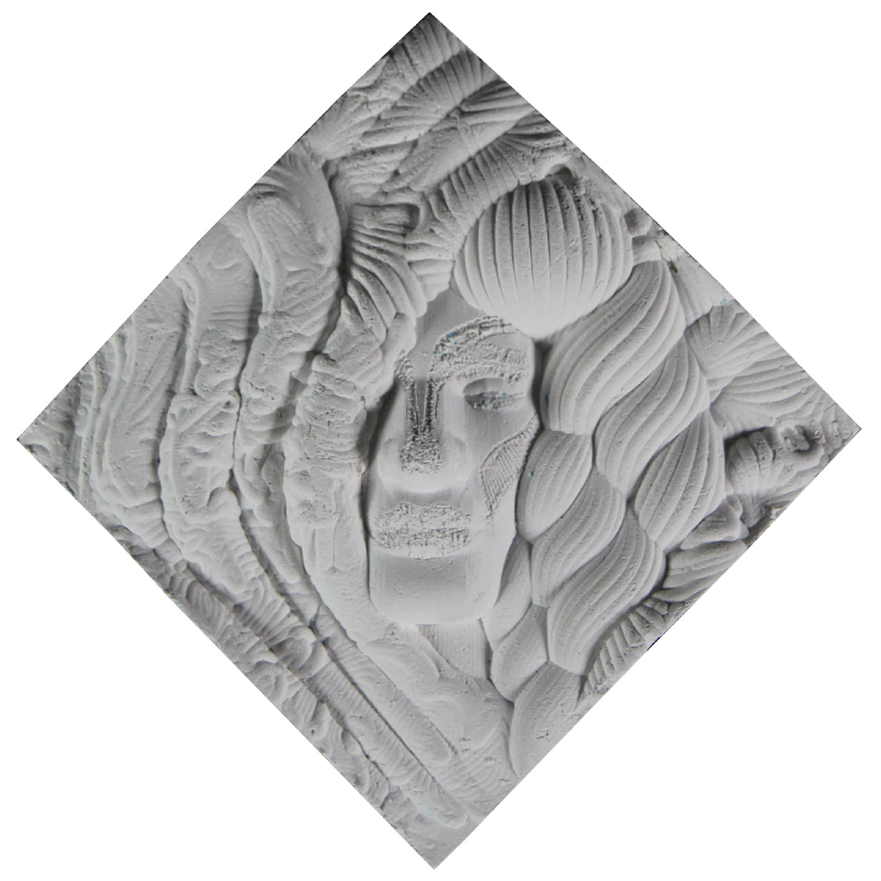 The square tile plays with the concept of the face. A masculine face was used as the base shape but the pathways programmed to carve out the face were based on the make up patterns of popular drag queens. In addition, the shapes used for hair curve