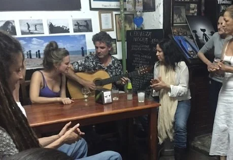Woman singing flamenco in a bar