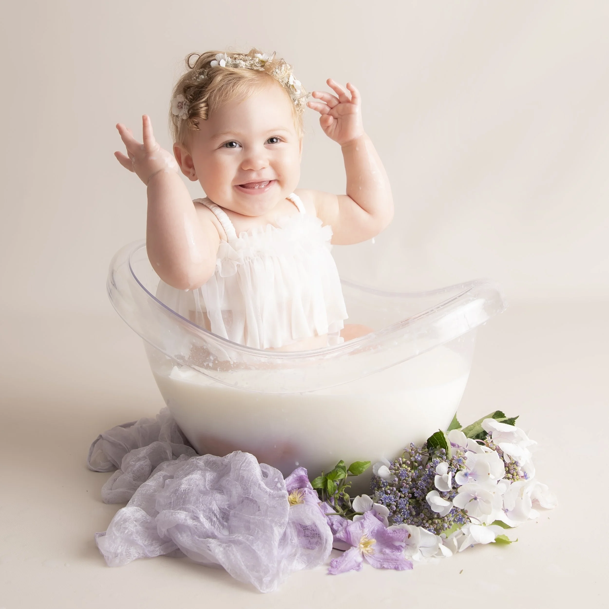 Milkbath with flowers from the garden