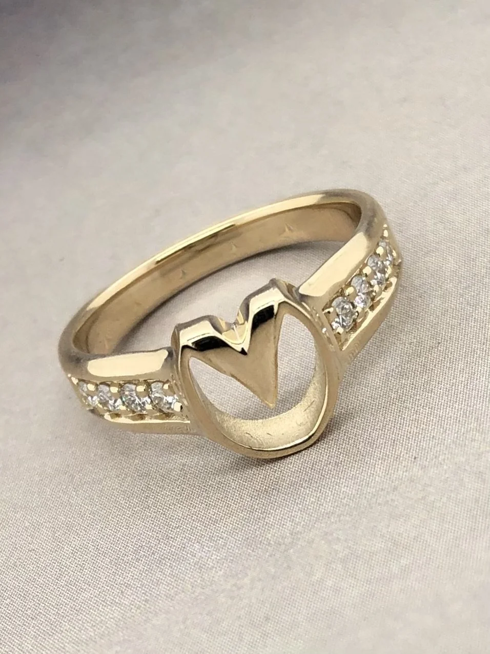 Barefoot ring w: side stones.jpeg