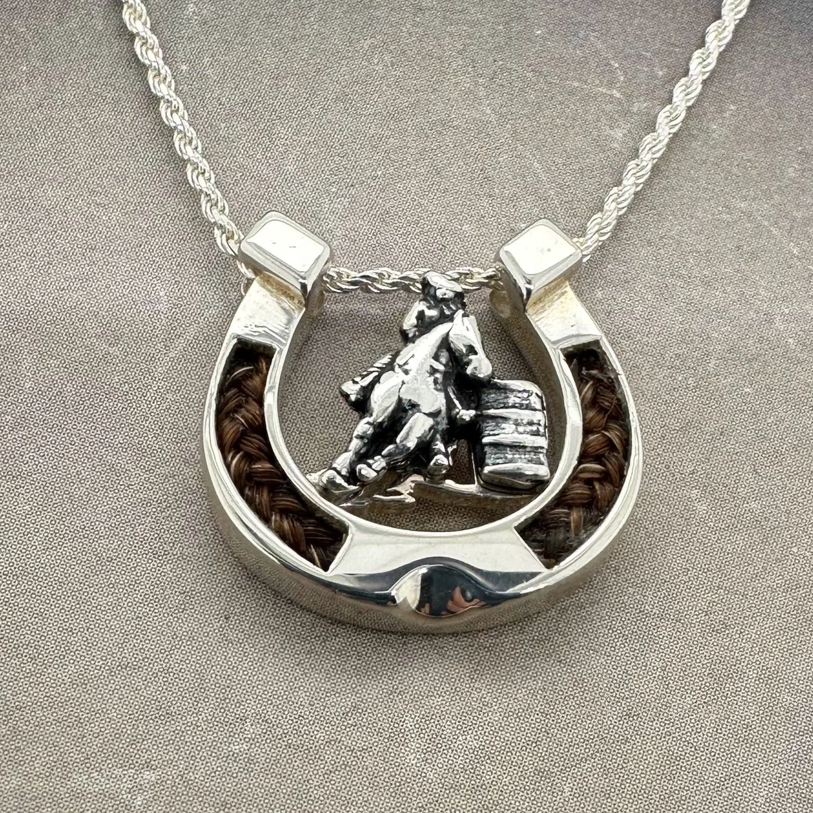 horseshoe with barrel racer.jpeg