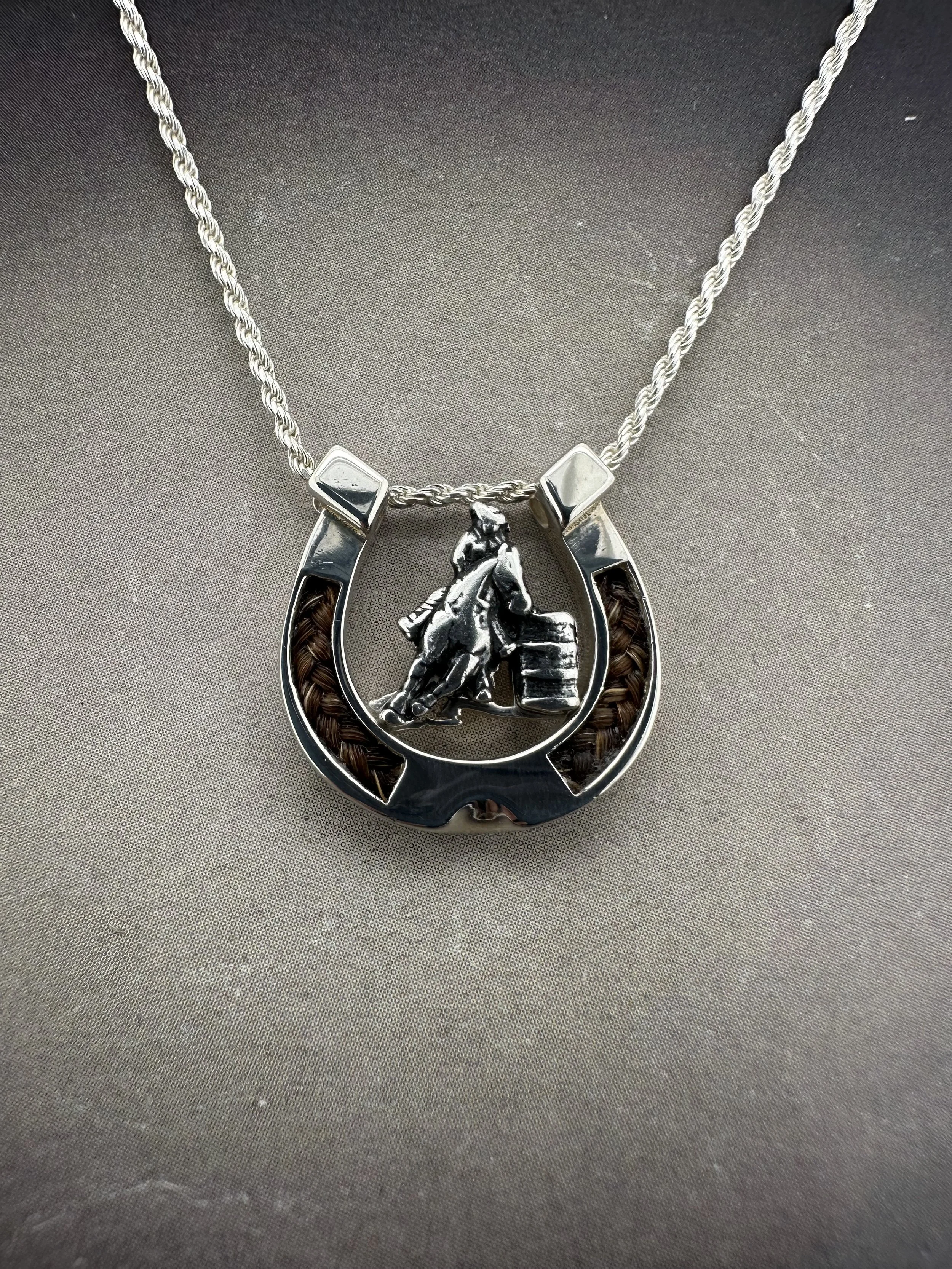 horseshoe with barrel racer2.jpeg