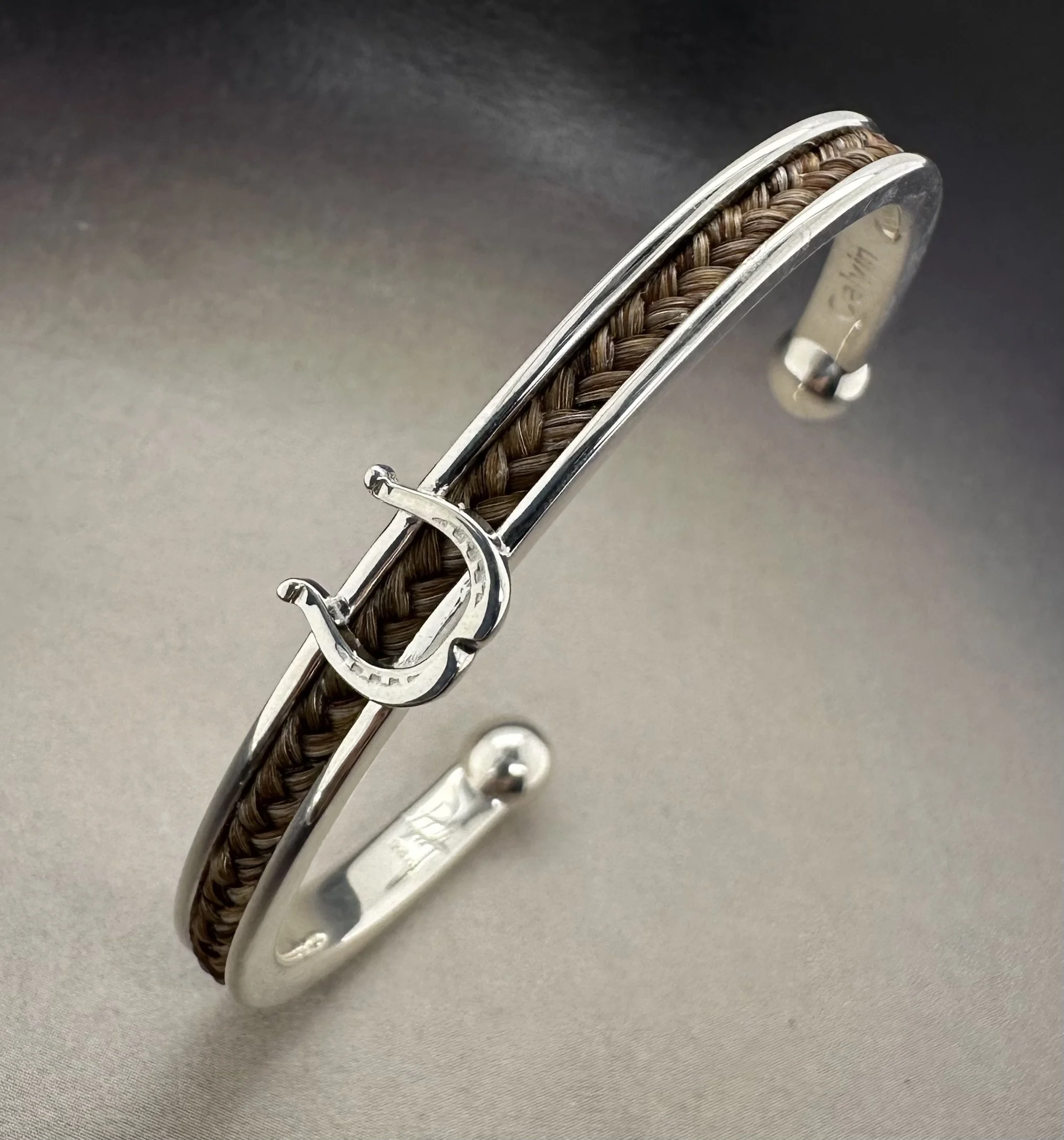 cuff with large draft shoe chesnut hair.jpeg