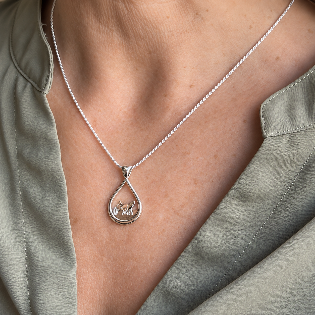 Silver Teardrop Carriage Horse on model Sage Green Blouse.png