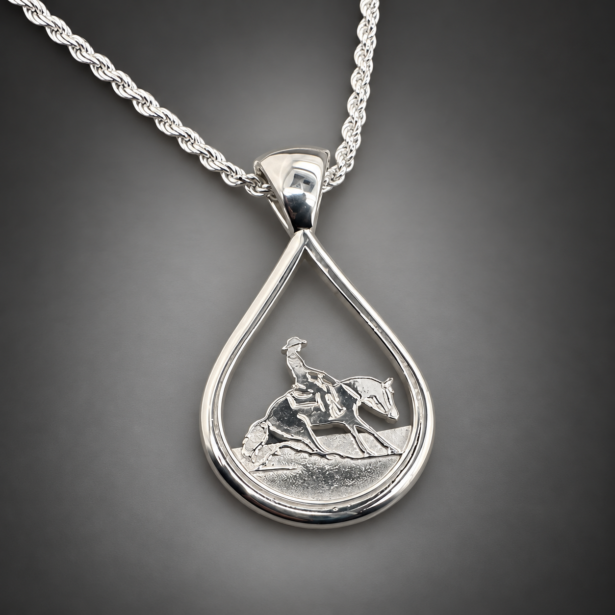 Silver Teardrop Reiner Rider Pendant close up.png