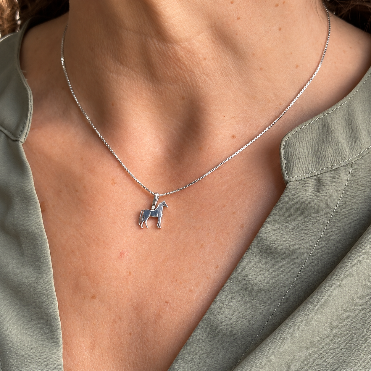 Silver Simple Bail Morgan Horse Pendant on model Sage Green Blouse.png