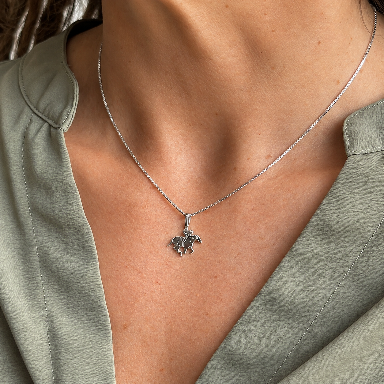 Silver simple Bail Race Horse Pendant Necklace on model.png