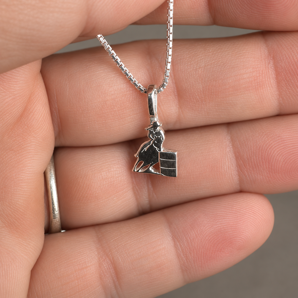 Silver Simple Bail Barrel Racing Pendant in Hand.png