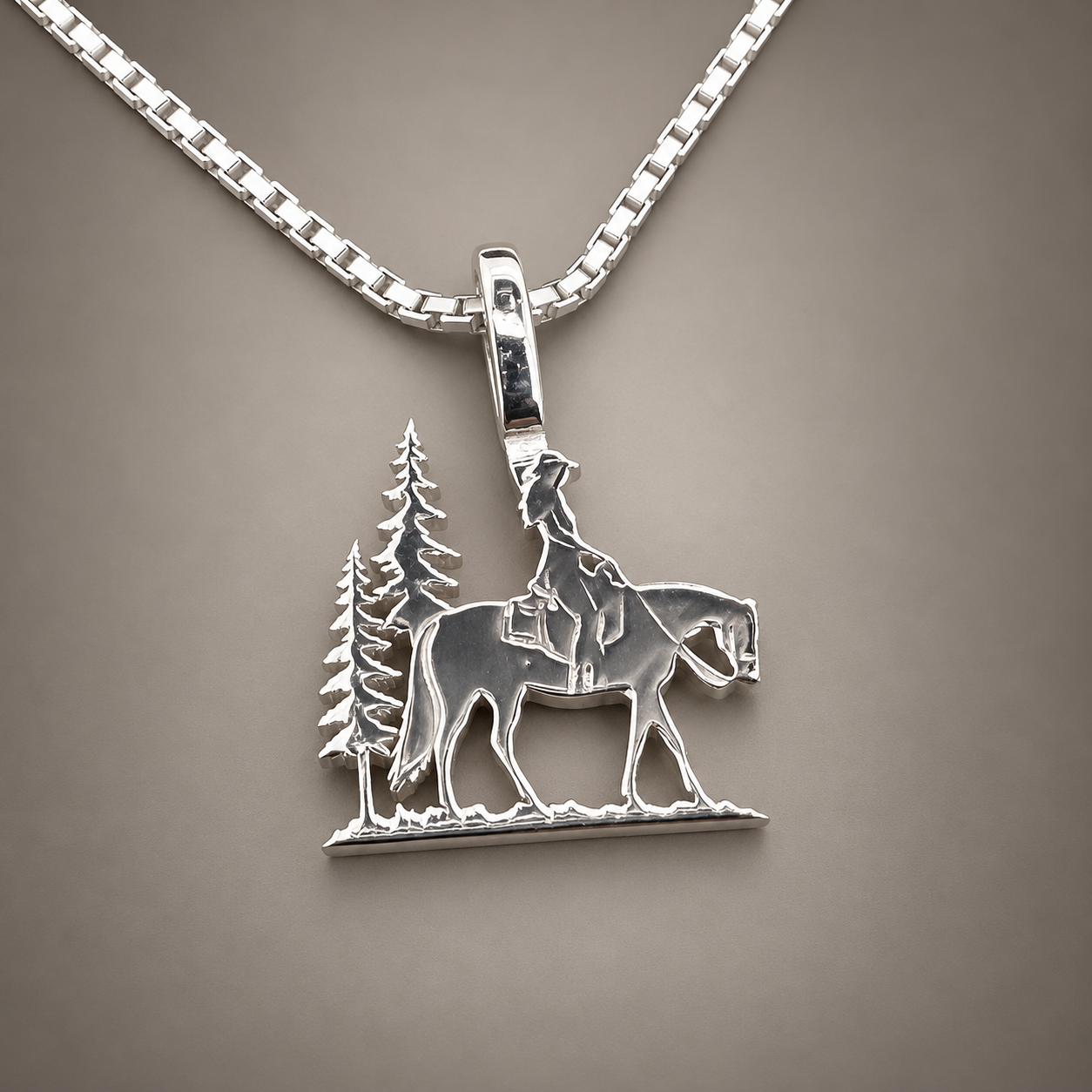Silver Simple Bail Trail Rider Pendant on Warm Gray.png
