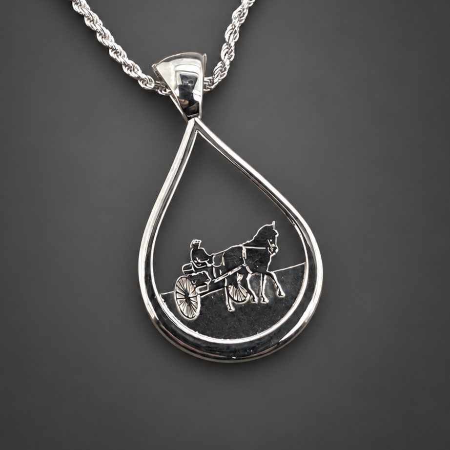 Silver+teardrop+horse-and-carriage+pendant+on+charcoal.png