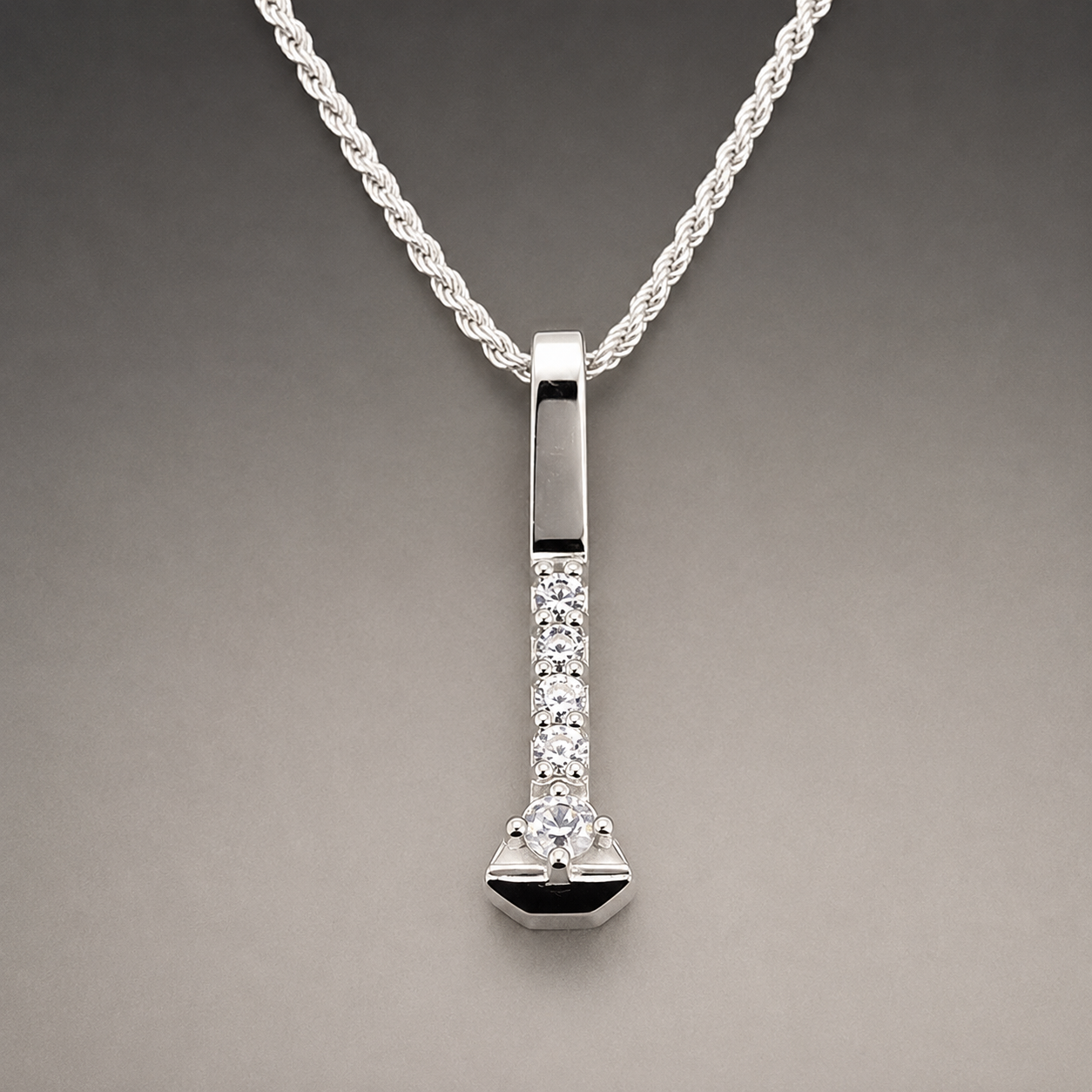 Horseshoe nail w: 5 stones web image.png