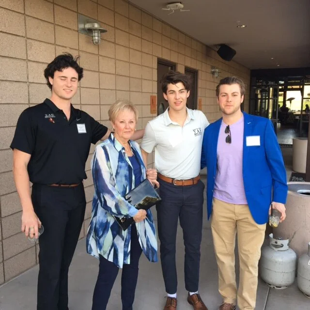 Carolee with grandsons.jpeg