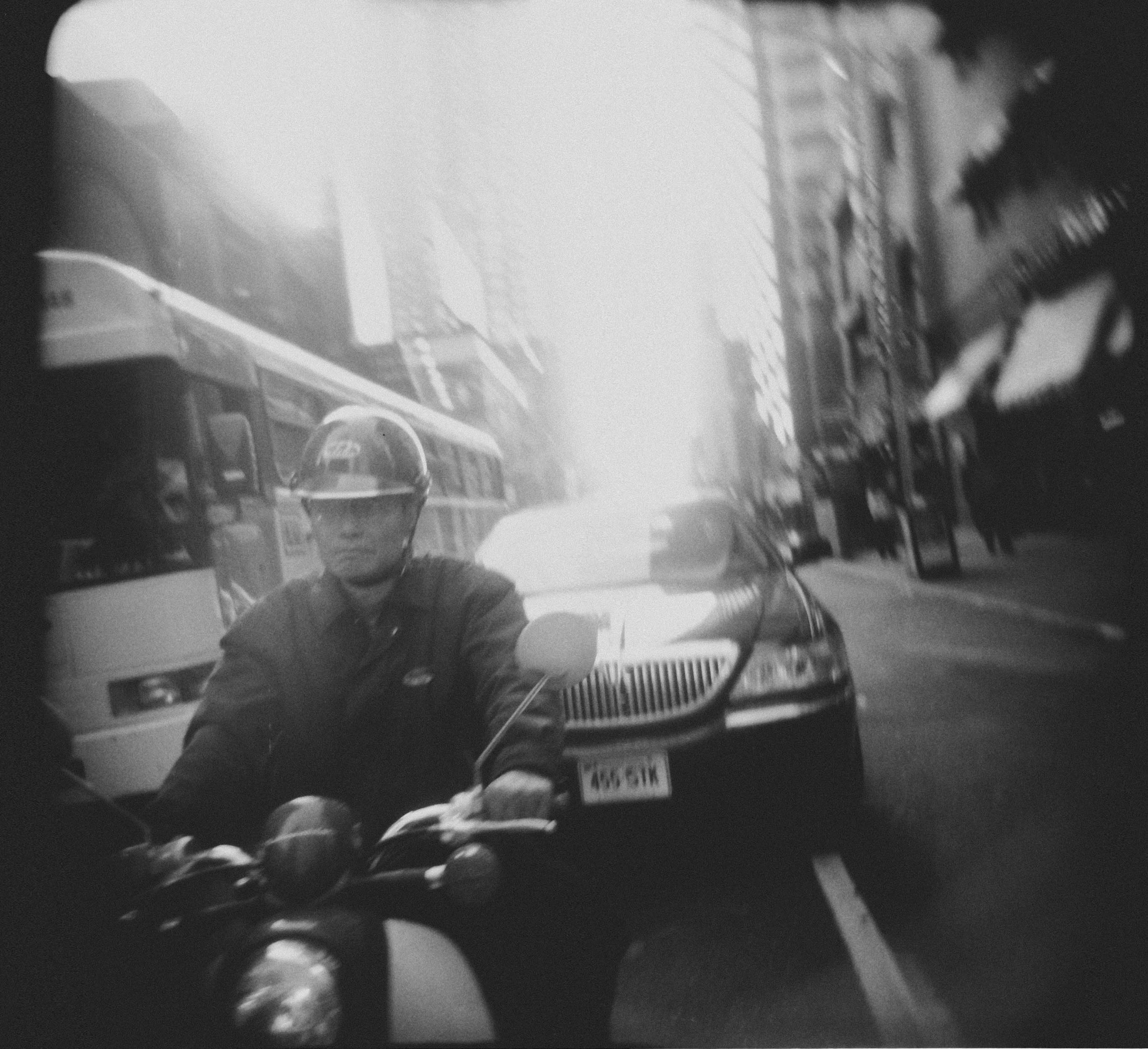 shane_deruise_alleyways_man_moped_holga.jpg