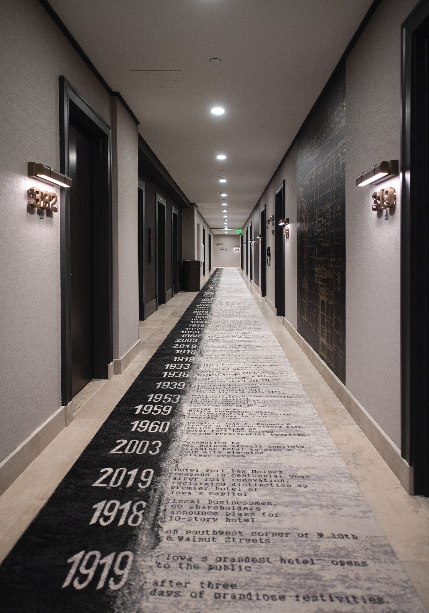 Another nod to the history of the building, the carpeting includes a historic timeline of the hotel