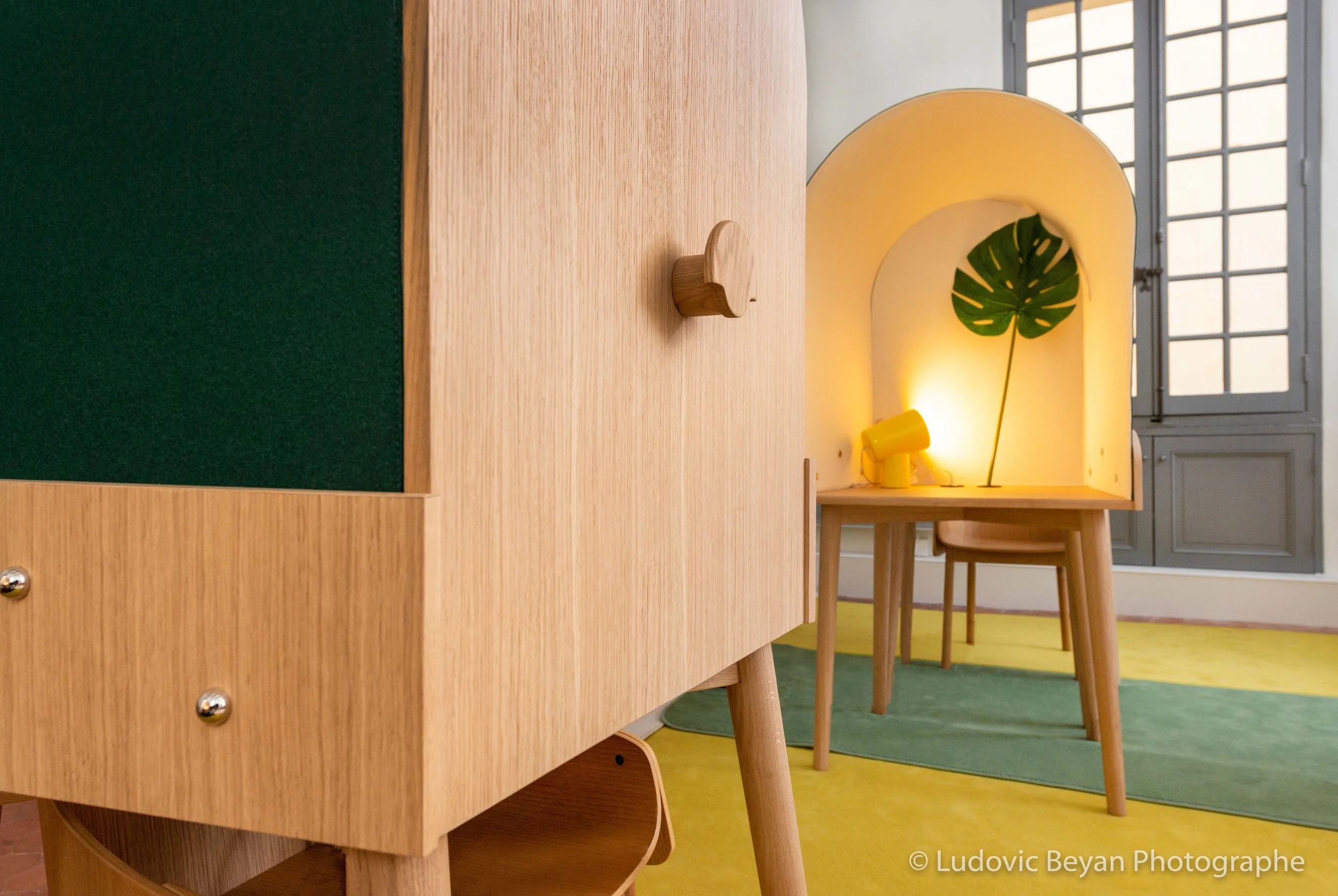 detail - coat hanger at the back of the desk