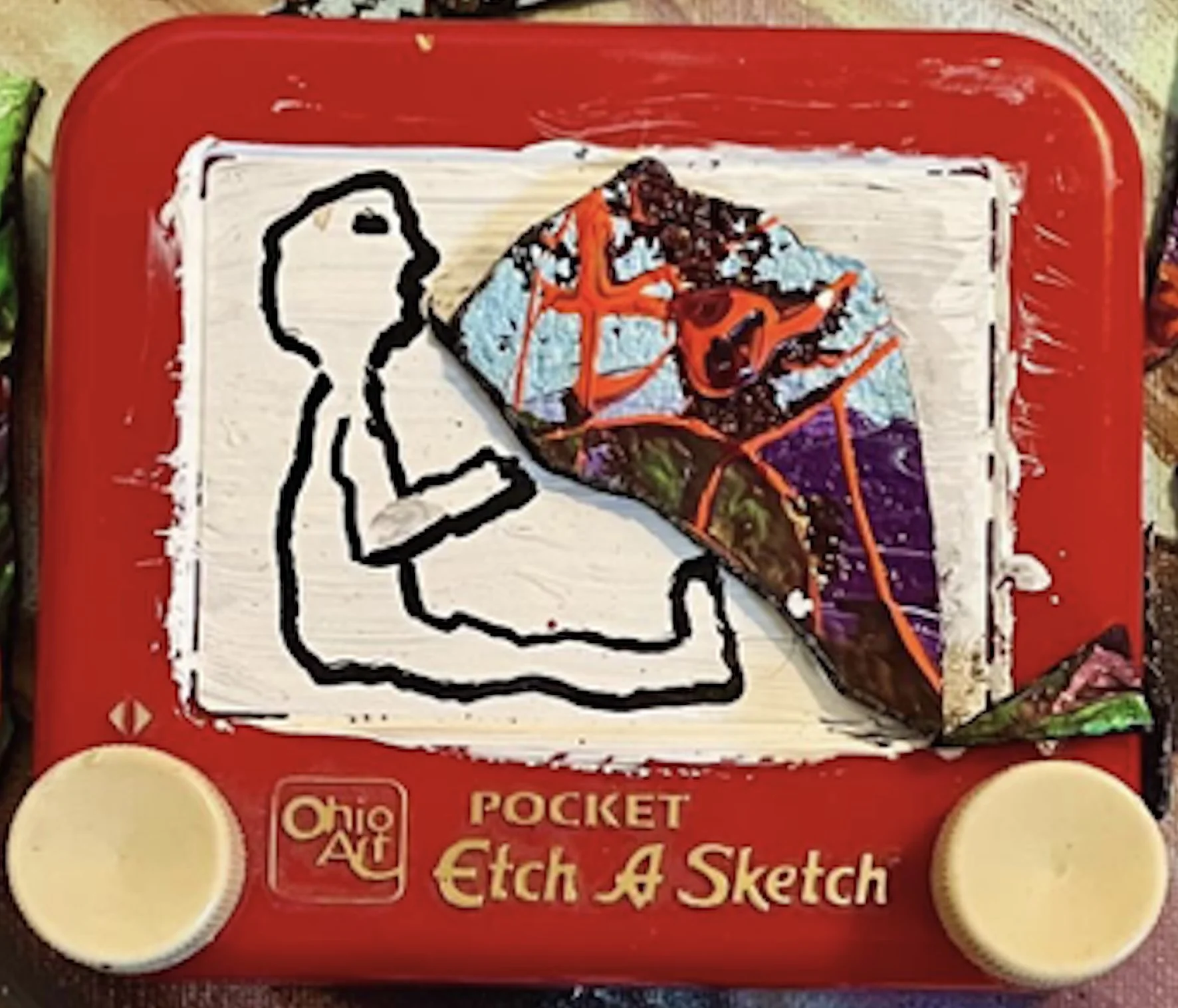 Throwing up Etch-a-Sketch.jpg