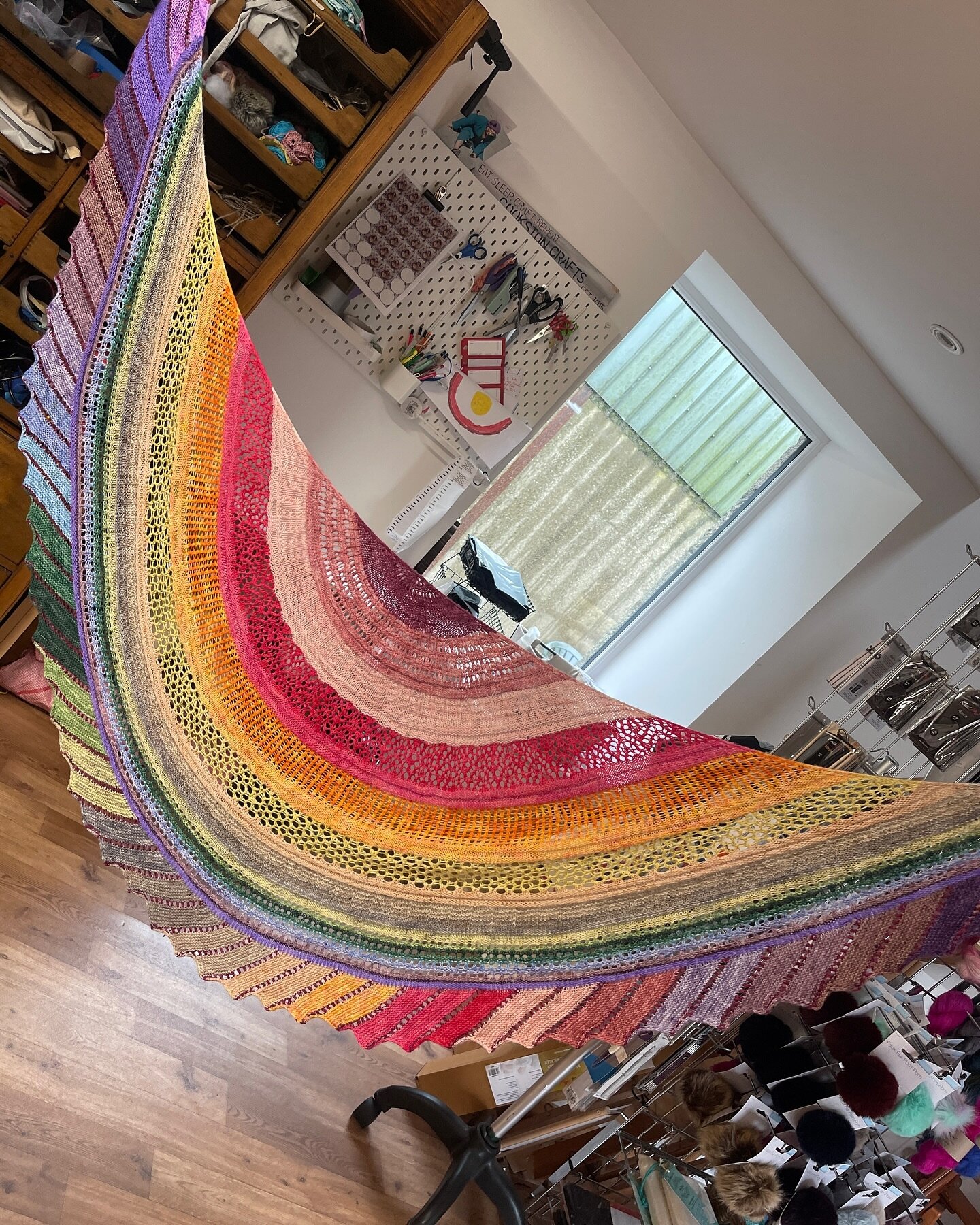 Can we take a moment to admire this Glittering Snowscape Shawl by @westknits which Celine knitted with the 2023 Castle Garden Advent calendar!!! 😮 

Such a statement project that&rsquo;s guaranteed to brighten up any outfit! 🌈 

The 2024 Advent Cal