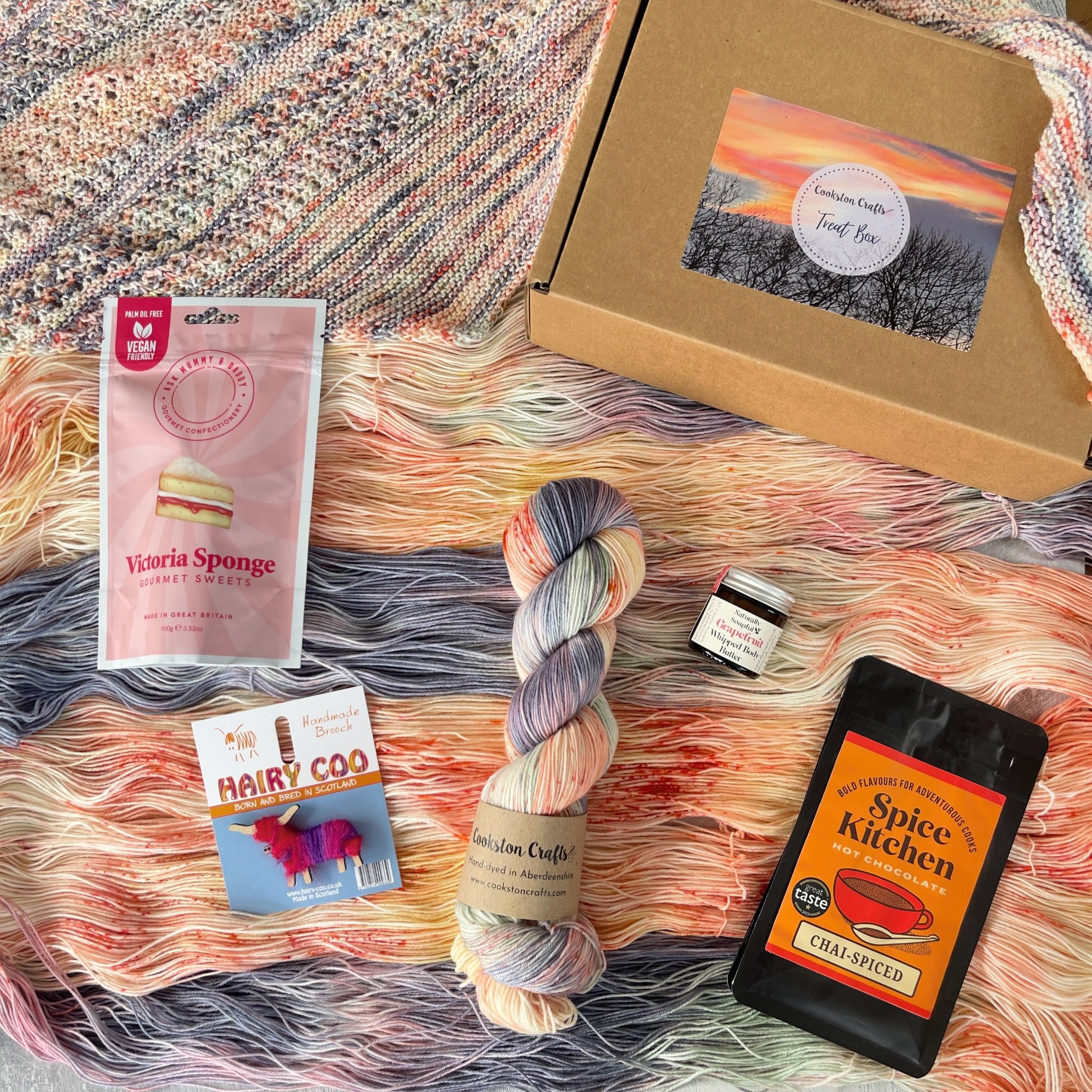 March Treat Box reveal!!

I chose a picture of these beautiful nacreous clouds that appeared in the sky over the house on Christmas Eve

The yarn picked up on the steel blue of the sky and the pink green and orange glow of the clouds.  It&rsquo;s a v