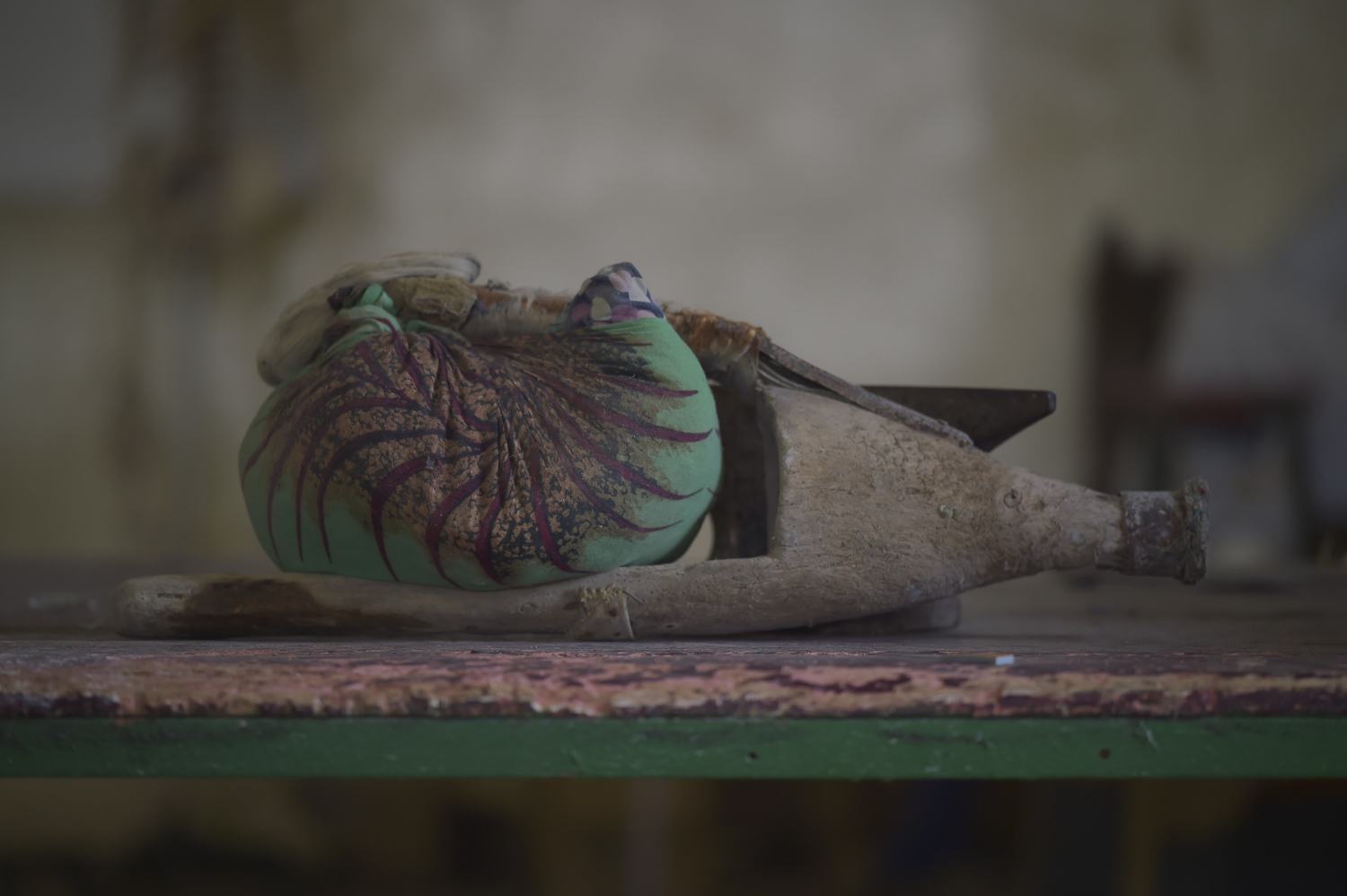 The former owner of this prosthetic, Madina, came to the center from the nearby town of Afgoye. She lost her leg due to disease and gangrine and had this made by a local craftsman for about $50. While older and traditional prosthetics are sometimes left at the center, more often than not they are taken home by their owners to be used while farming so that their better prosthetic can be saved from too much ware.