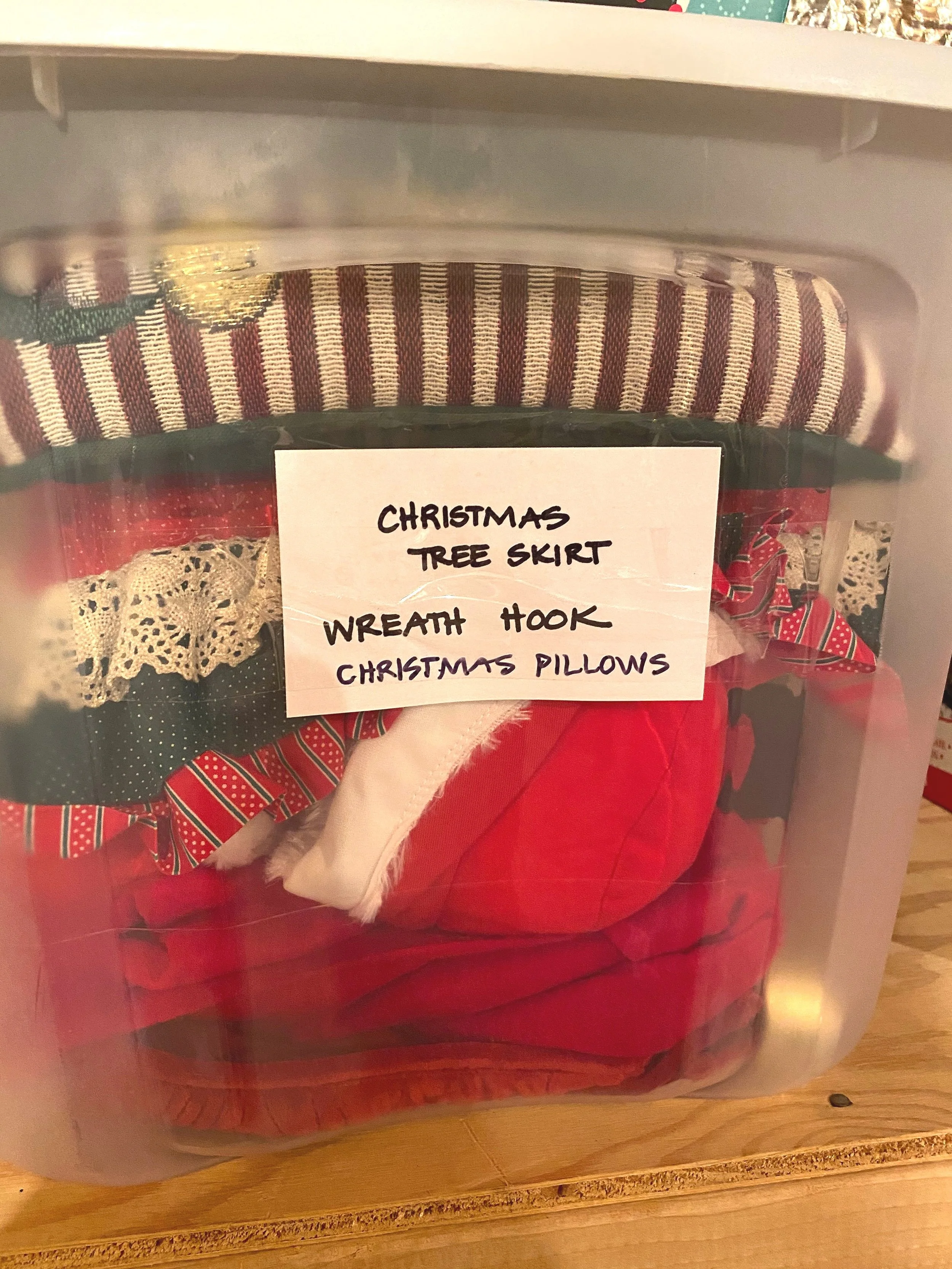 Organization bin labeled with Christmas decor