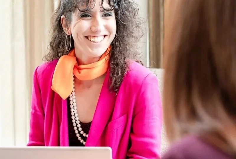 Giada talking to a client during the trust recession