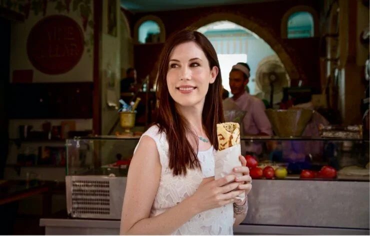 Tori Avey holding a wrap.