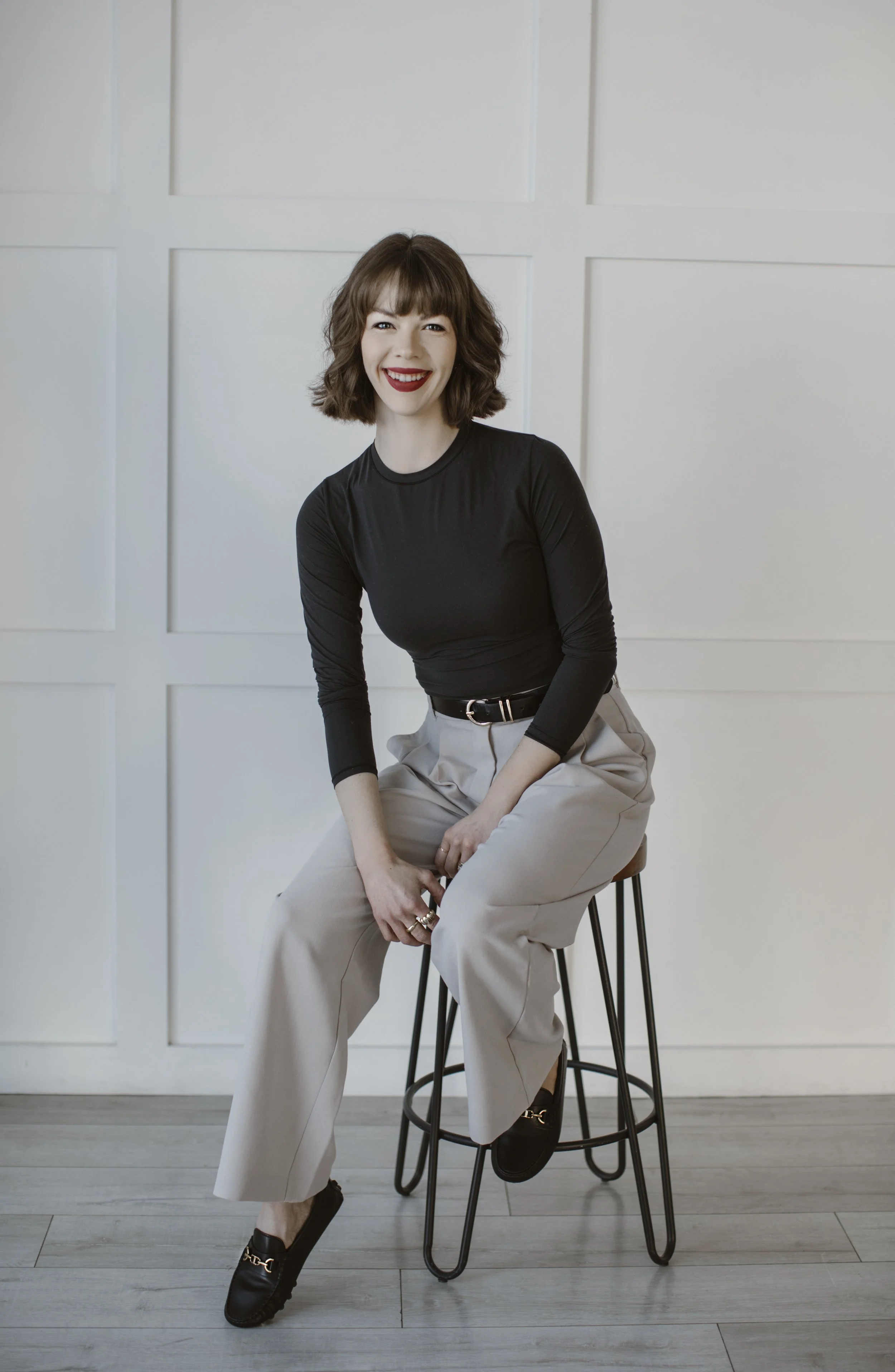 Shyanne Reynolds siting on a stool.
