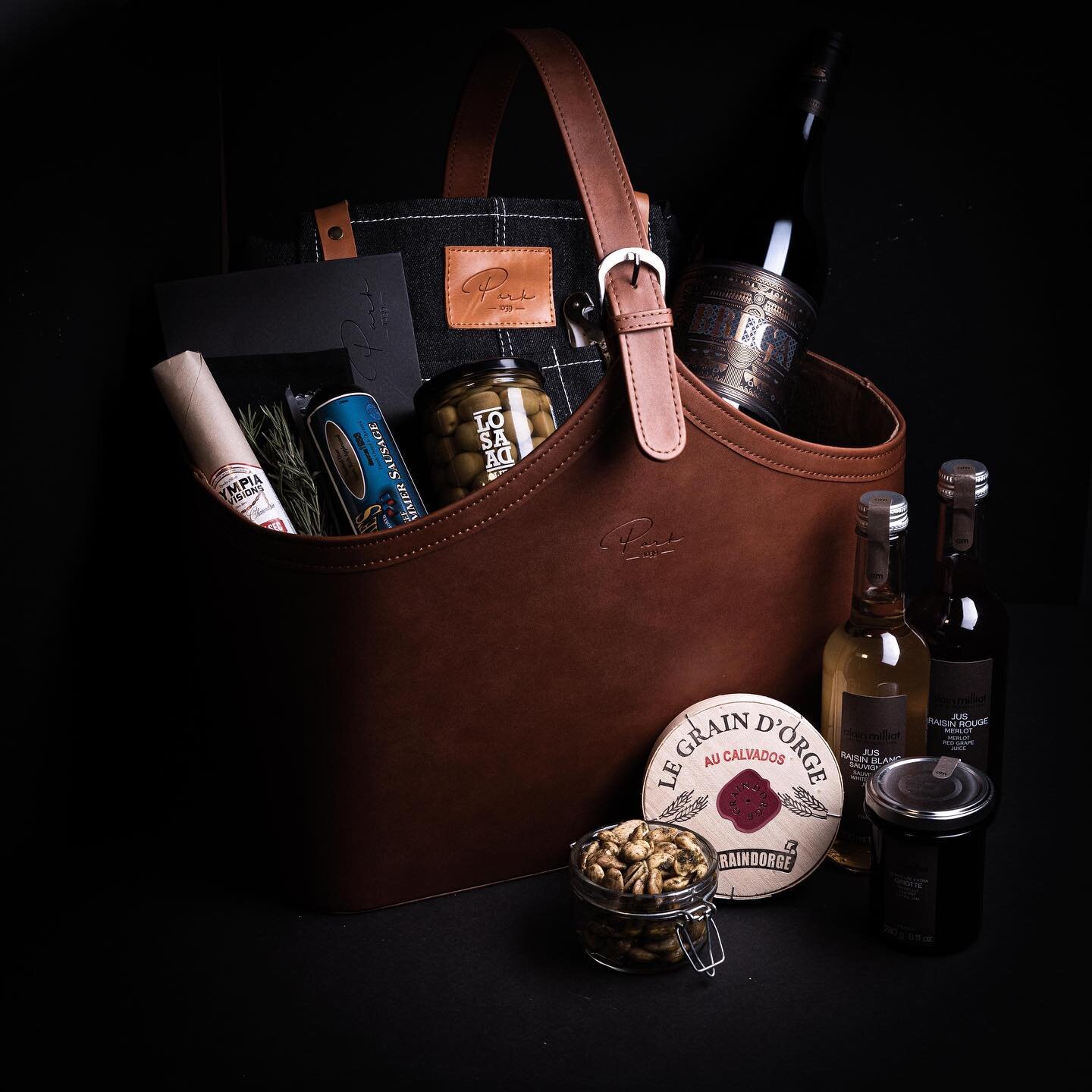 Give the gift of luxury gift baskets to your favorite friends, family, or clients. Featuring high quality culinary gifts from Europe and a selection of house made gourmet foods, this hand-made leather gift basket is sure to impress. To make it even m