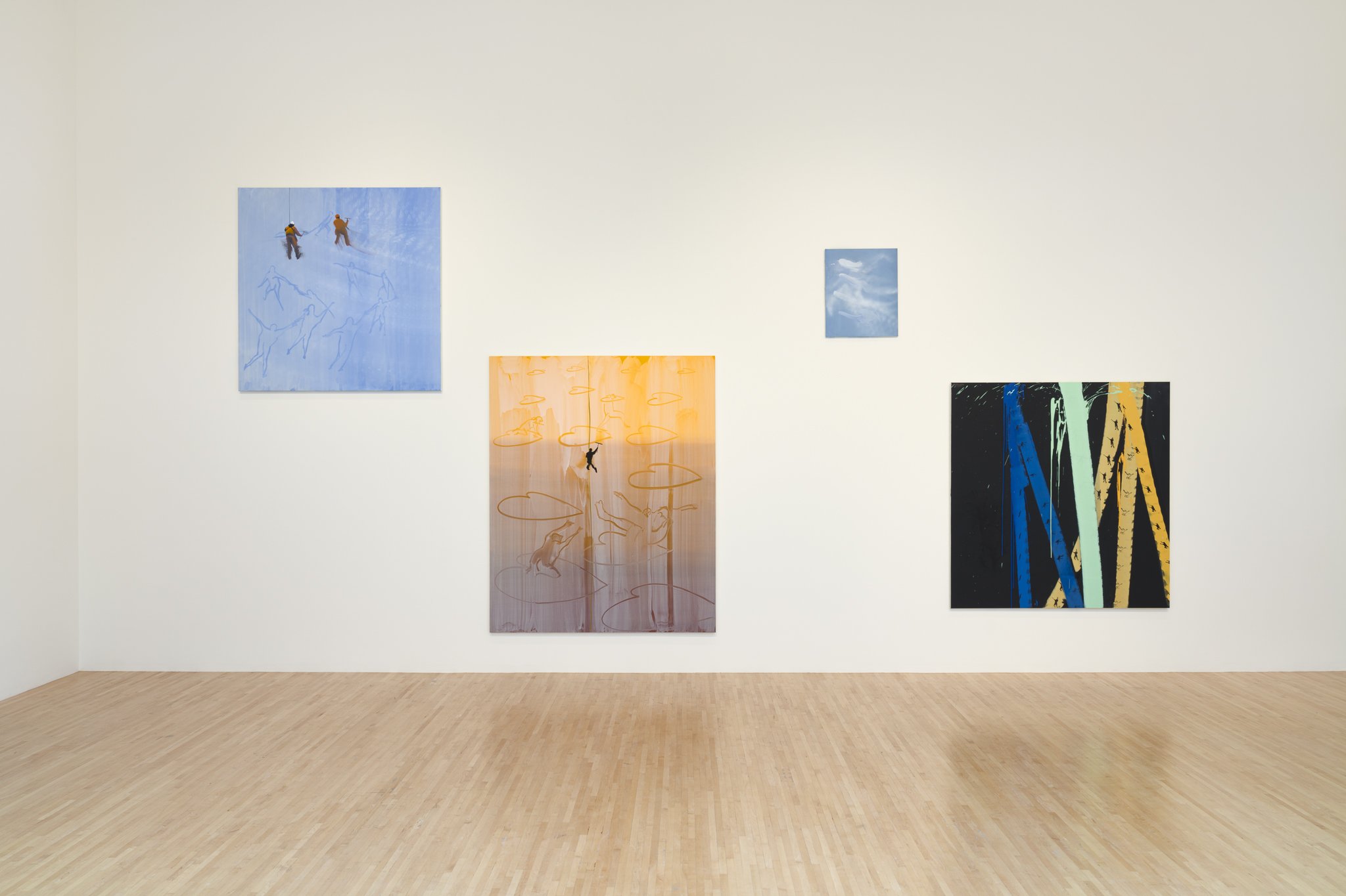 wood sheds with video screens and paintings in a gallery