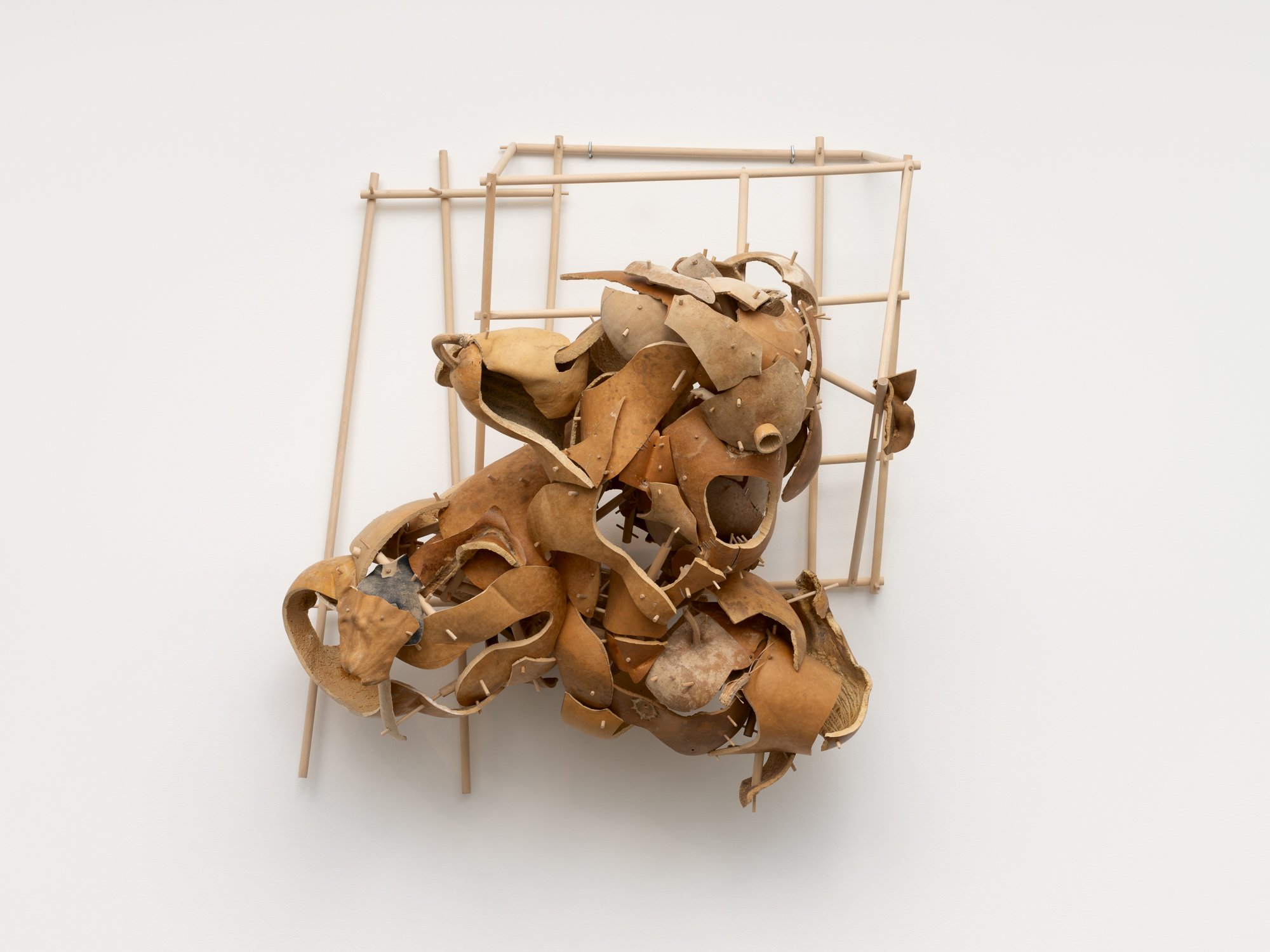 a large sculpture made of gourds and sticks