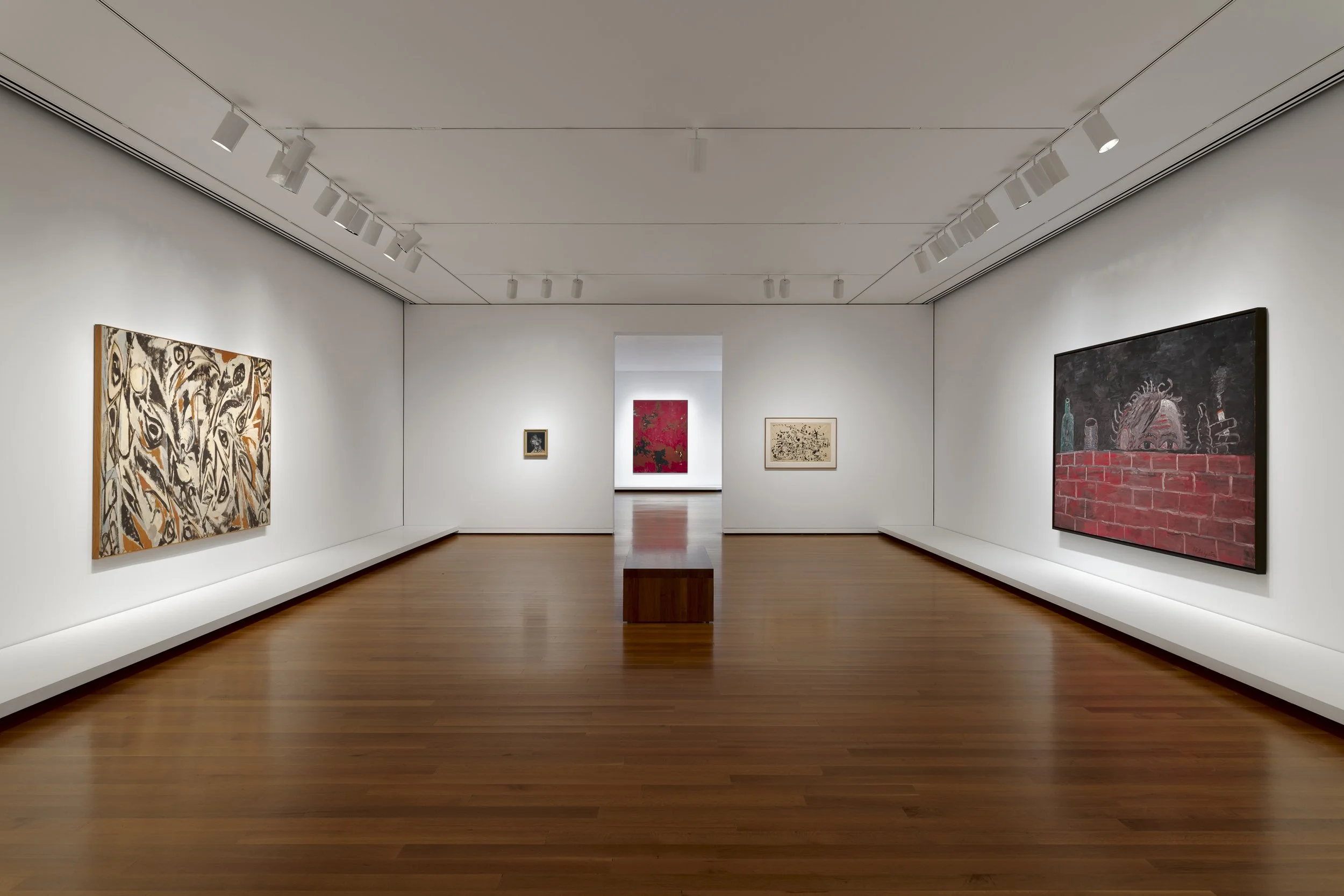 various paintings in a gallery