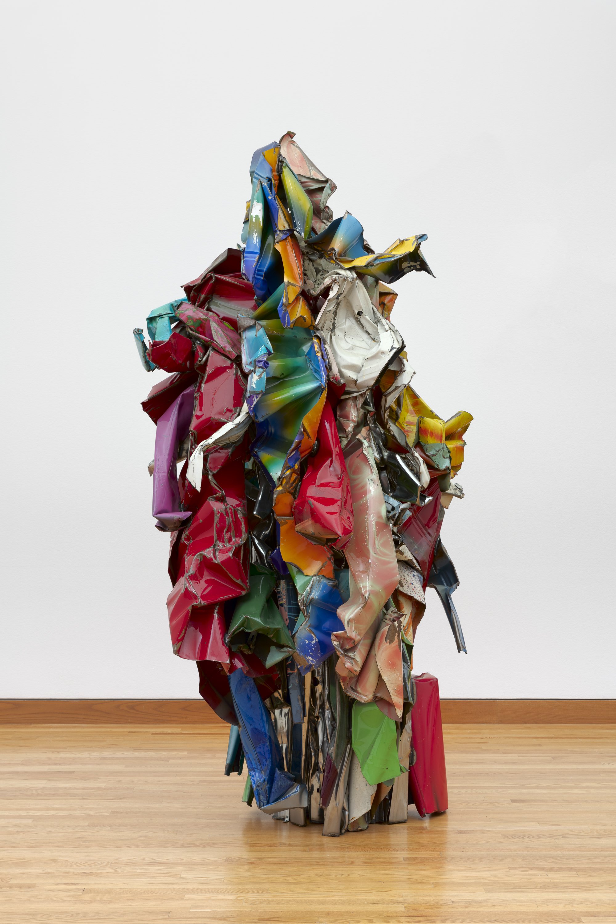 a large sculpture made of colorful metal